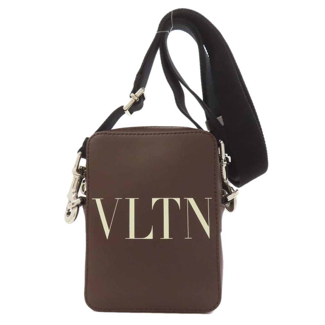 Valentino Logo Leather Shoulder Bag: Valentino Logo Leather Shoulder Bag Elevate your style with the iconic Valentino logo leather shoulder bag, boasting sleek dark brown leather exterior and timeless design that exudes luxury. The class