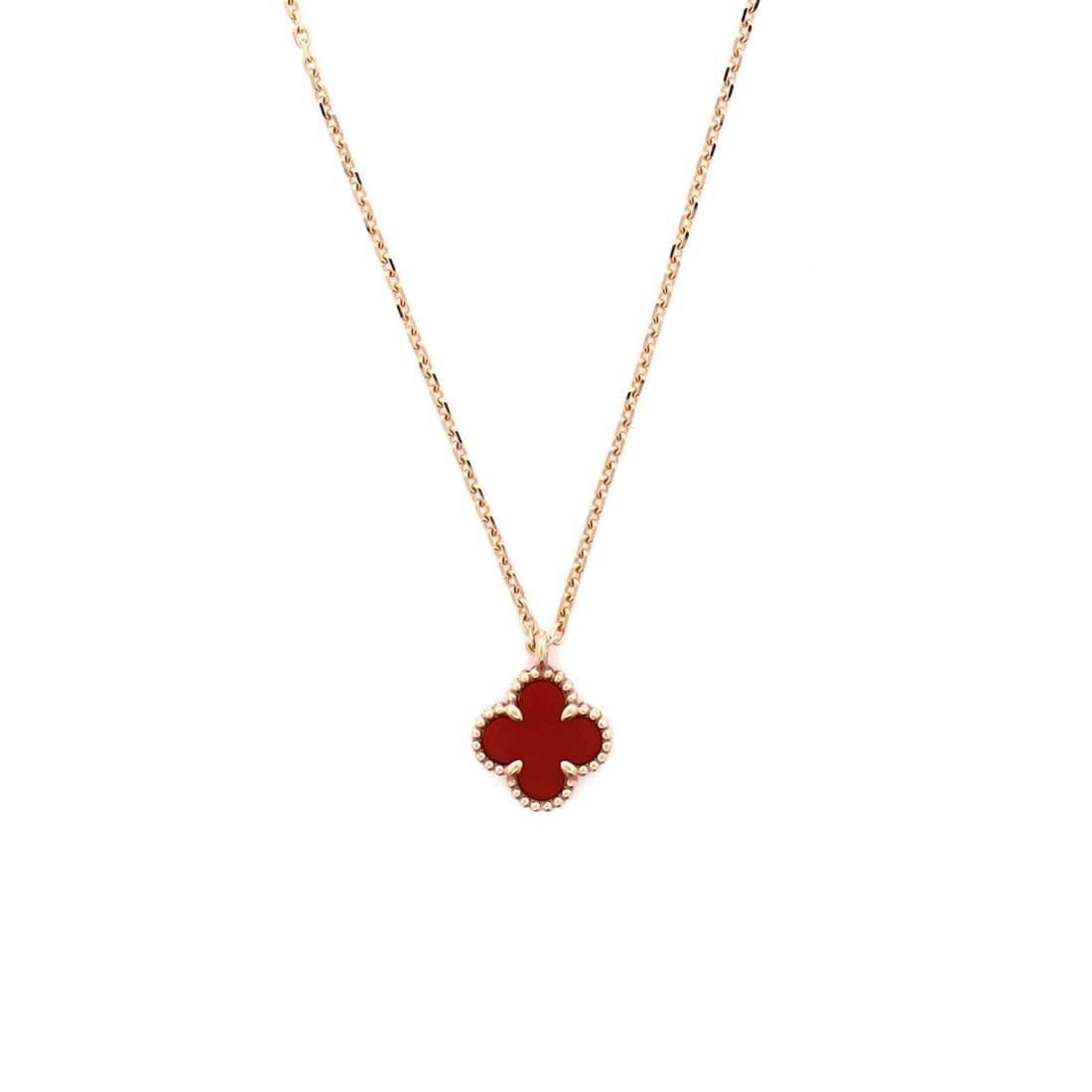 Van Cleef & Arpels Sweet Alhambra Pendant Necklace in 18k Rose Gold with Carnelian.: Van Cleef & Arpels Sweet Alhambra Pendant Necklace in 18k Rose Gold with Carnelian. Elevate your elegance with the iconic Van Cleef & Arpels Sweet Alhambra Pendant Necklace, crafted in 18k rose gold a