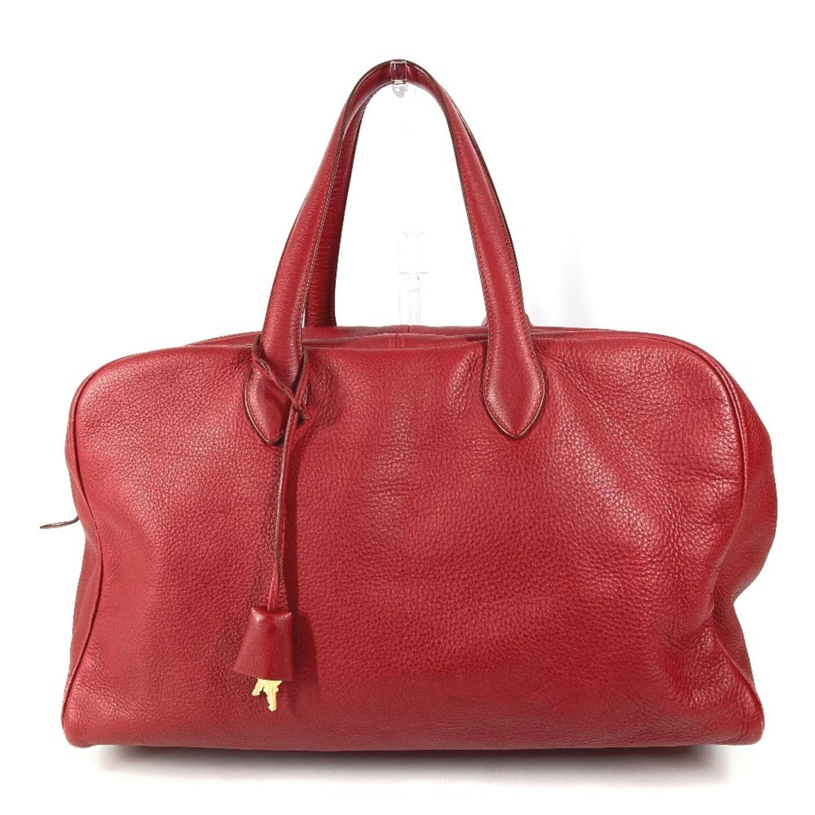 Leather Hermes Boston Bag Taurillon Clemence: Leather Hermes Boston Bag Taurillon Clemence A stunning pre-owned Hermes Boston Bag in rich red Taurillon Clemence leather, boasting elegant gold hardware and timeless sophistication. This classic