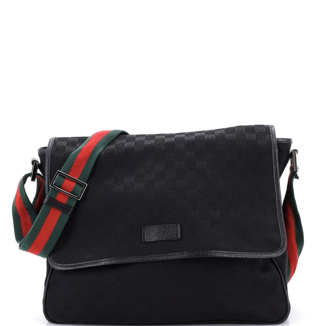 Gucci Medium GG Canvas Flap Web Strap Messenger: Gucci Medium GG Canvas Flap Web Strap Messenger A classic Gucci messenger bag, the GG Canvas Flap Web Strap is a timeless piece that exudes luxury and sophistication. With its iconic web strap