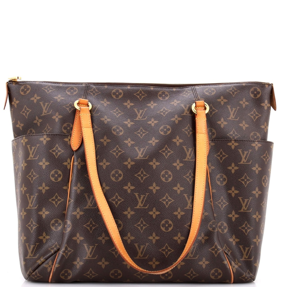 Louis Vuitton GM Monogram Canvas Totally Handbag: Louis Vuitton GM Monogram Canvas Totally Handbag A stylish and timeless Louis Vuitton GM Totally Handbag, crafted from iconic monogram canvas, boasts a classic brown hue that adds warmth to any