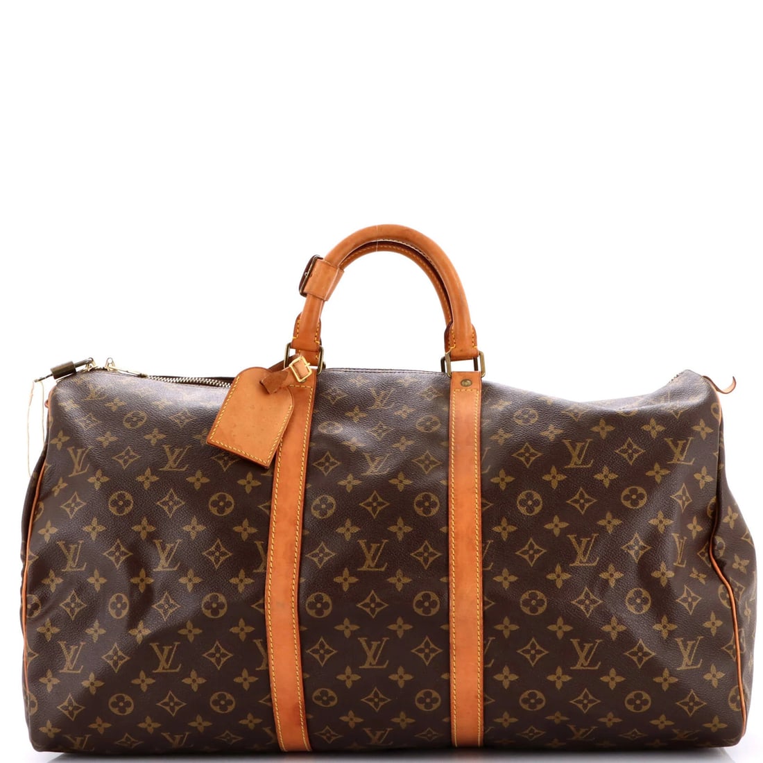 Louis Vuitton Monogram Canvas Keepall Bag - 55: Louis Vuitton Monogram Canvas Keepall Bag - 55 Own the timeless elegance of Louis Vuitton's iconic Monogram Canvas Keepall Bag, with its rich brown exterior and signature pattern. This classic duffle