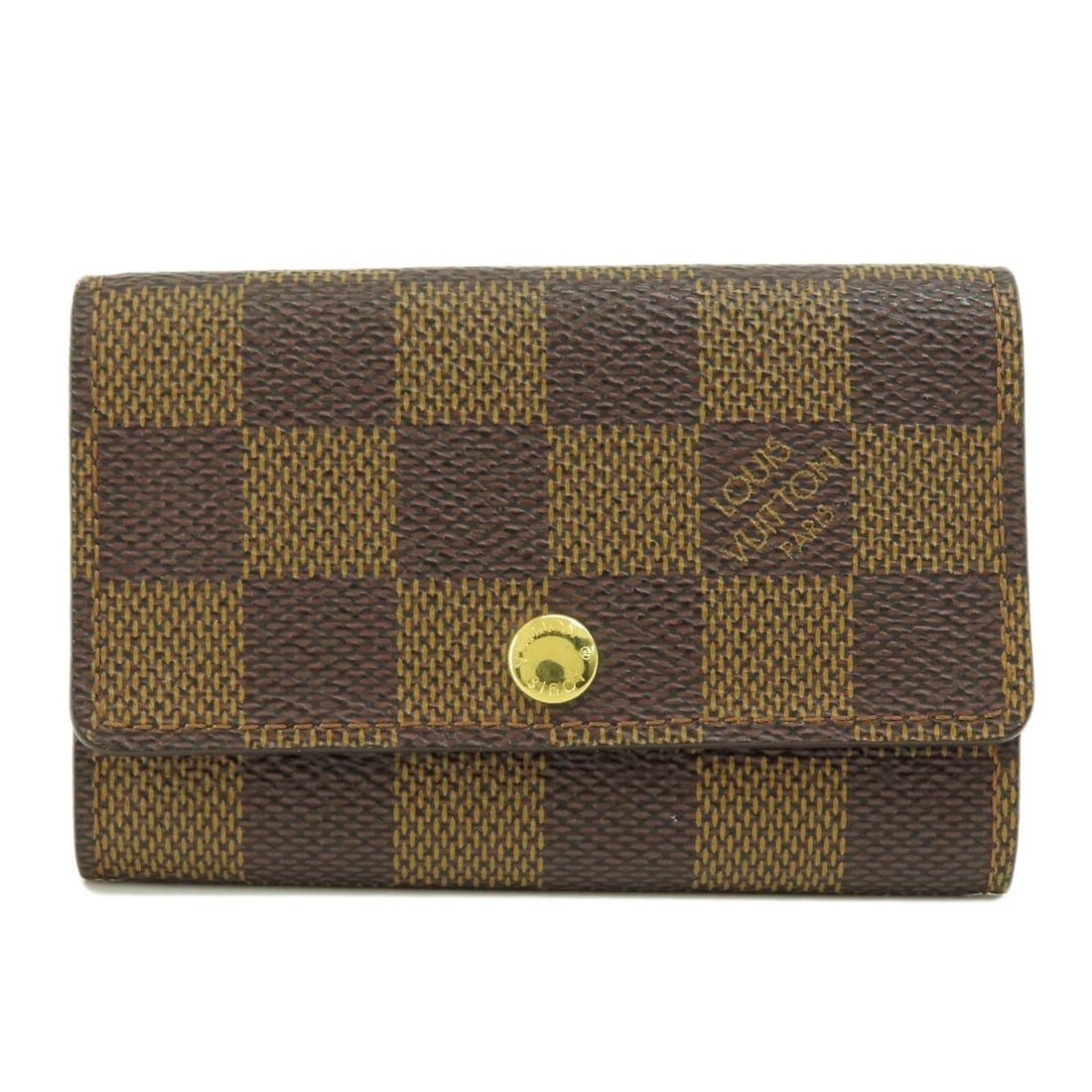 Louis Vuitton N62630 Key Holder in Damier Canvas: Louis Vuitton N62630 Key Holder in Damier Canvas Elevate your daily essentials with the iconic Louis Vuitton N62630 Key Holder, crafted from rich Damier canvas in a timeless Ebene brown hue. This
