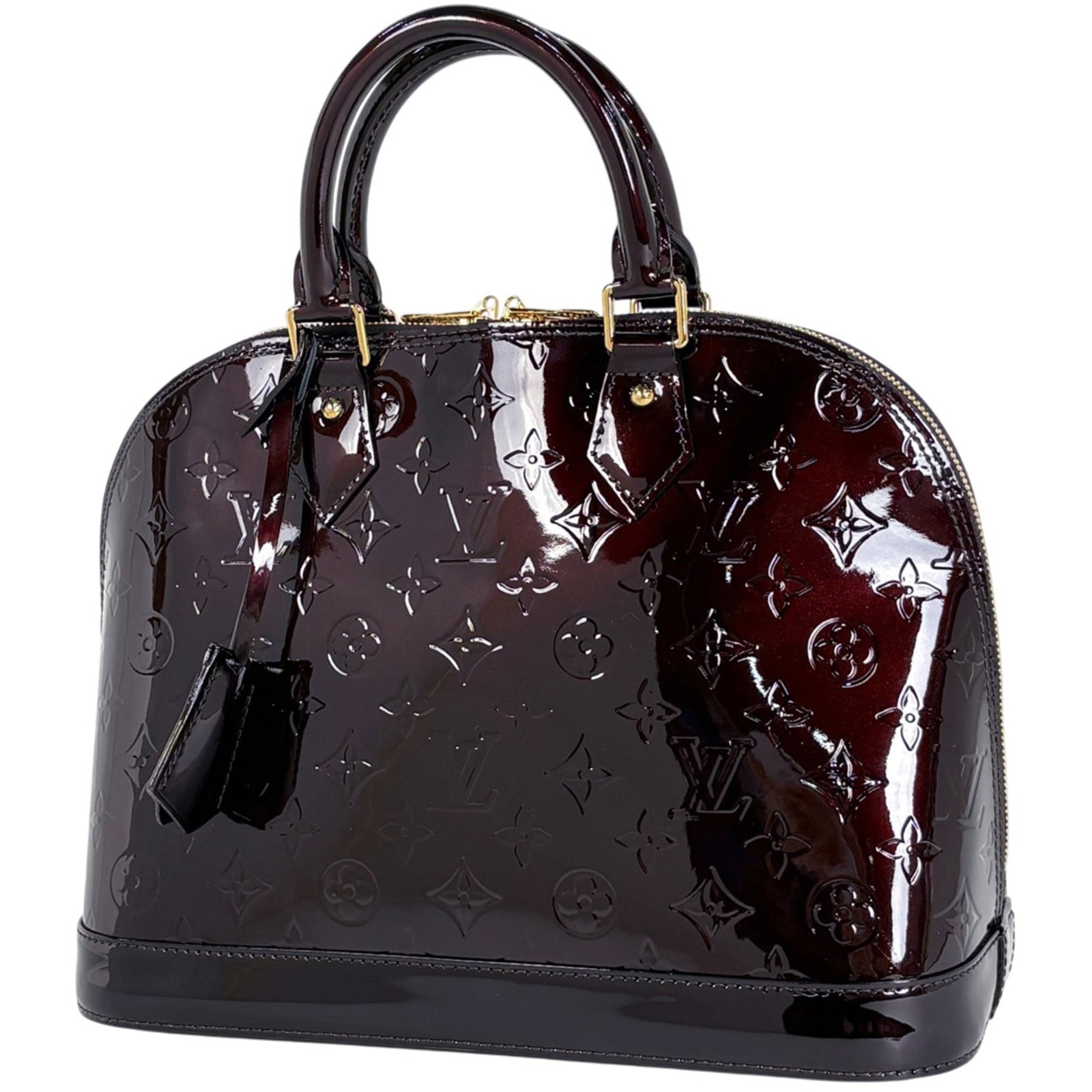 Louis Vuitton Patent Leather Handbag: Louis Vuitton Patent Leather Handbag A stunning Louis Vuitton Amarante patent leather handbag, with its sleek and sophisticated design, is up for grabs. This iconic piece boasts the signature LV