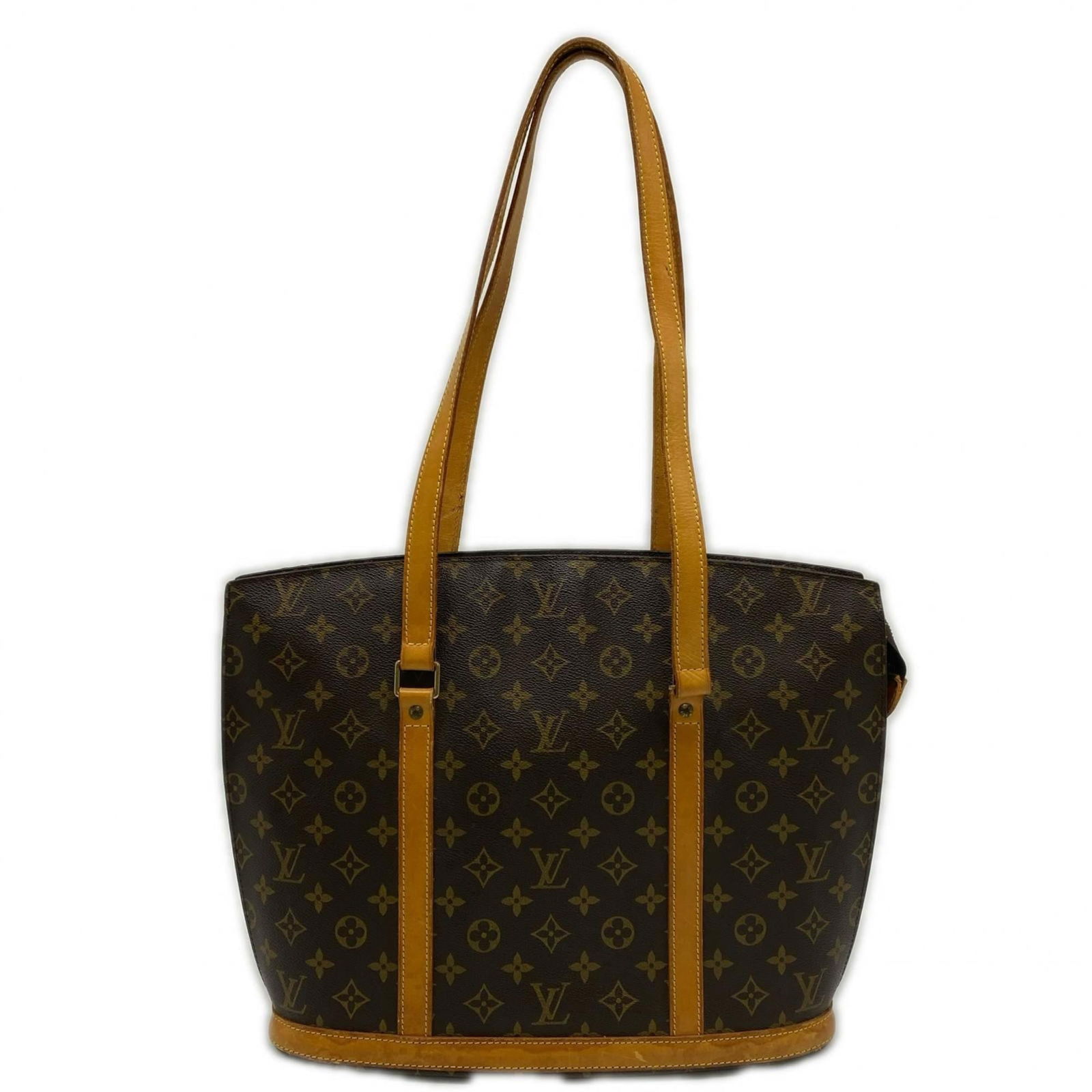 Louis Vuitton Coated Canvas and Leather Handbag: Louis Vuitton Coated Canvas and Leather Handbag A timeless piece from the iconic Louis Vuitton brand, this brown coated canvas and leather handbag boasts a classic design with premium materials that