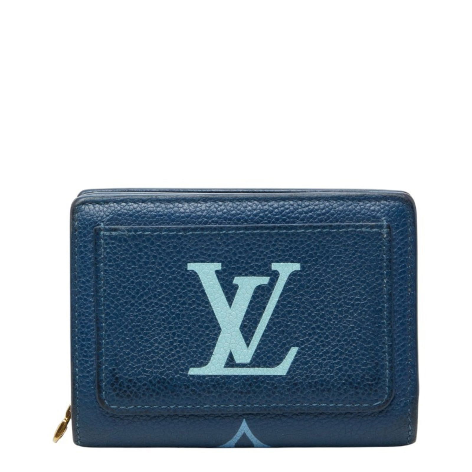 Louis Vuitton Bi-Fold Leather Wallet: Louis Vuitton Bi-Fold Leather Wallet A pre-owned Louis Vuitton bi-fold leather wallet in stunning blue and white hues, boasting the iconic LV monogram pattern. With its classic design and premium