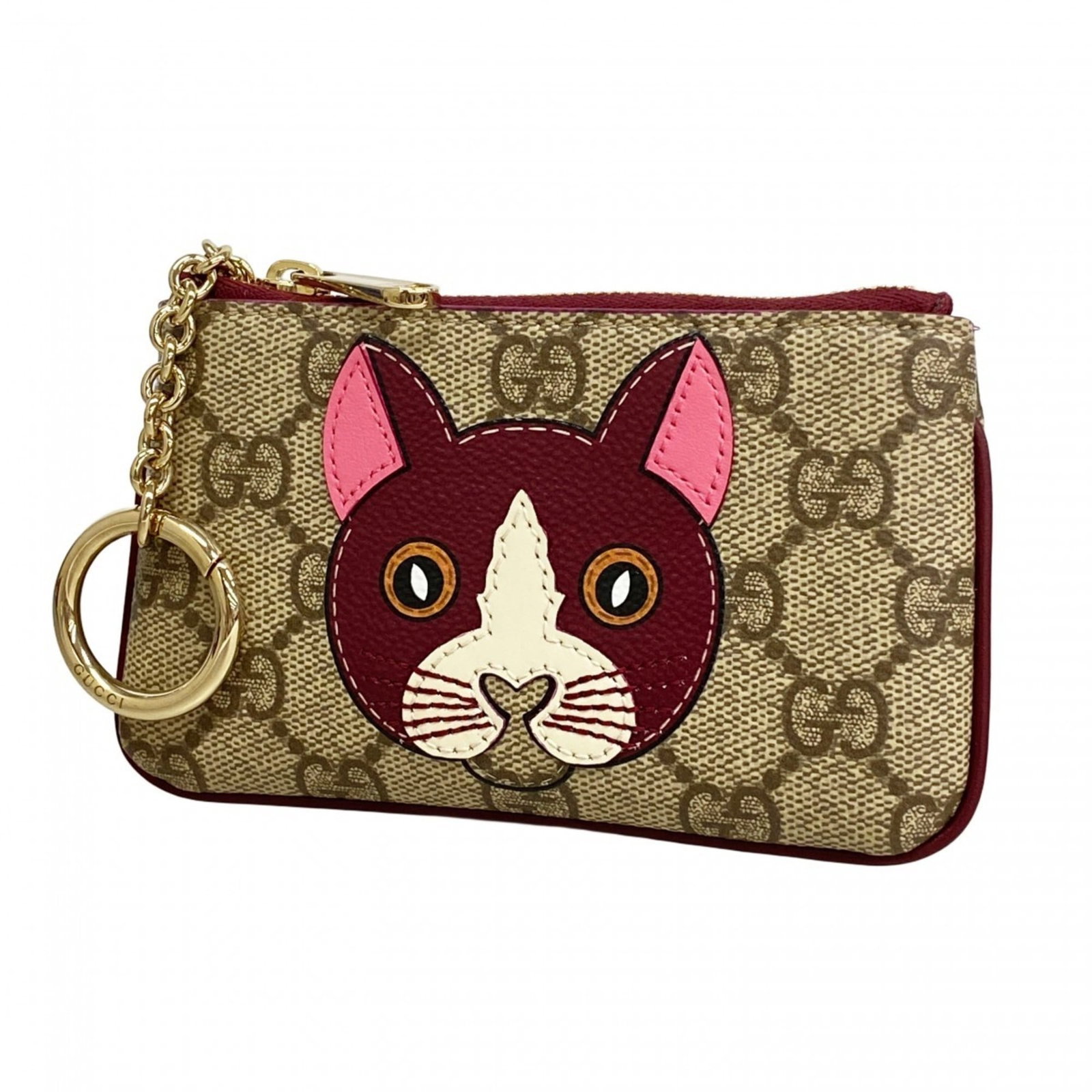 Gucci Coin Purse in PVC: Gucci Coin Purse in PVC A chic and timeless accessory, this Gucci coin purse in PVC is a must-have for any fashion enthusiast. Its sleek design and classic beige color make it perfect for adding a