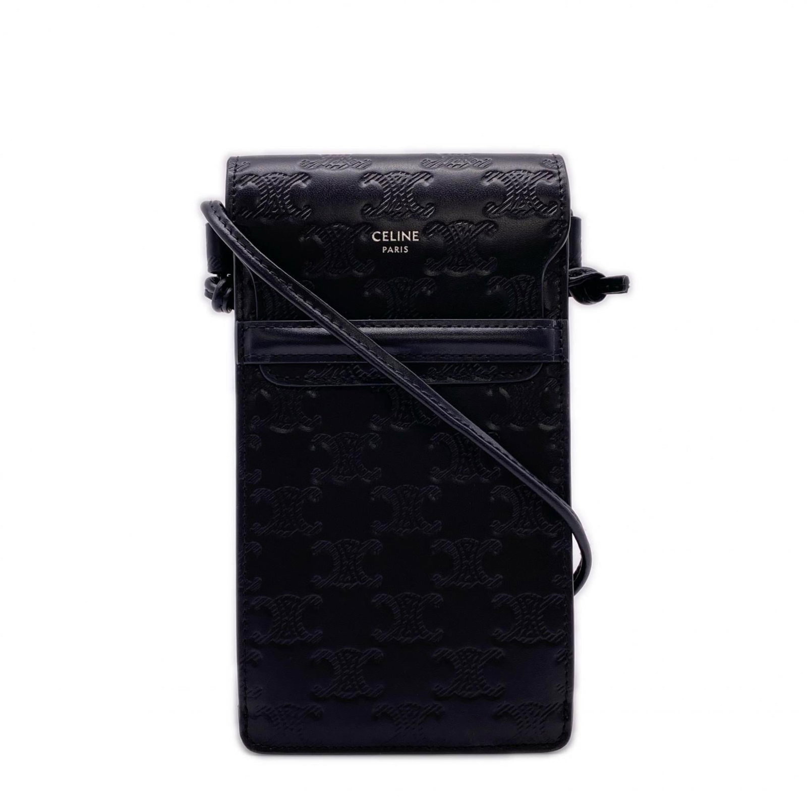 Celine Leather Shoulder Bag: Celine Leather Shoulder Bag A sleek and sophisticated Celine leather shoulder bag in black, perfect for adding an air of elegance to any outfit. With its spacious open pockets and interior pocket, thi