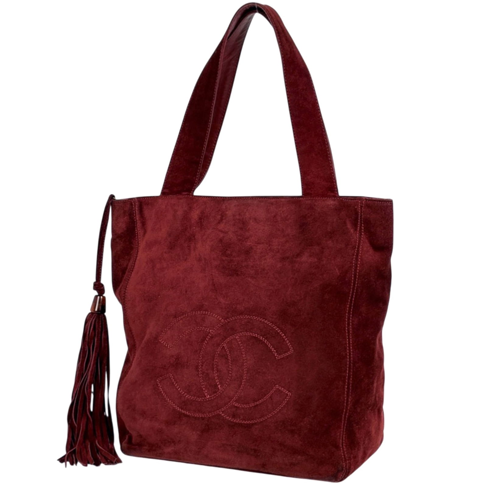 Chanel Suede Leather Tote Bag: Chanel Suede Leather Tote Bag A stunning Chanel Suede Leather Tote Bag in bold red hue, perfect for making a statement. With its classic shoulder strap and timeless design, this bag is both elegant
