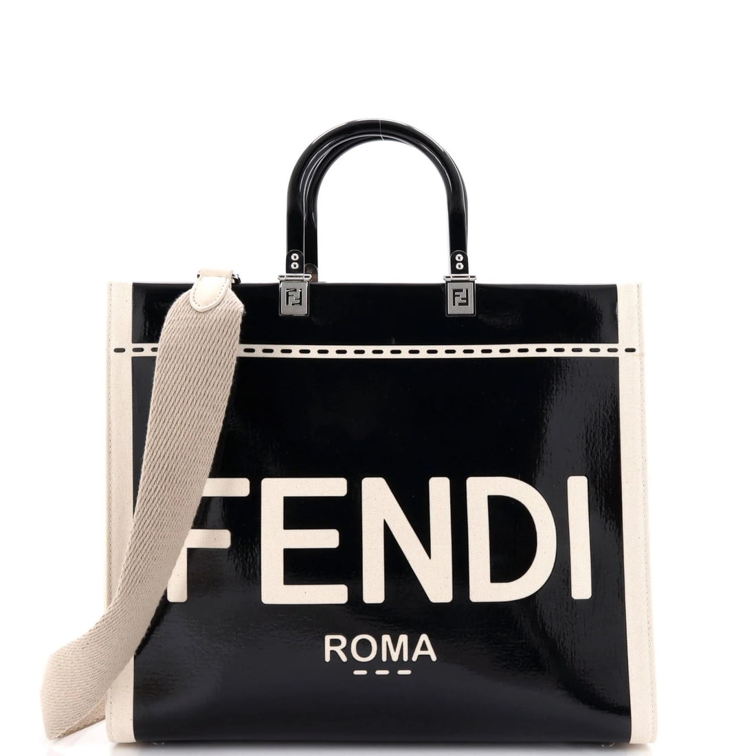 Fendi Sunshine Shopper Tote in Patent Canvas Medium: Fendi Sunshine Shopper Tote in Patent Canvas Medium Experience the iconic Fendi Sunshine Shopper Tote in Patent Canvas Medium, boasting sleek patent leather exterior and neutral canvas interior. This
