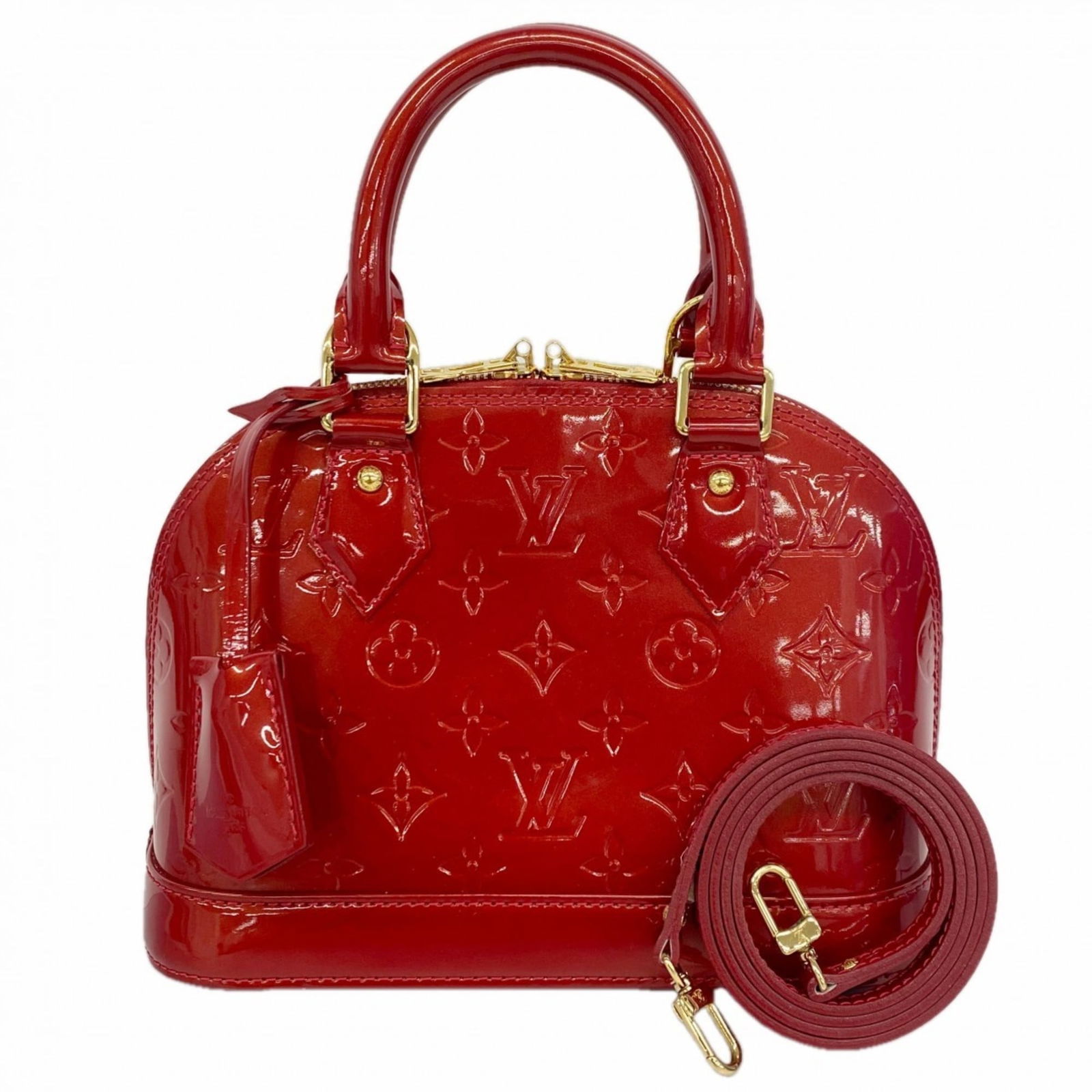 Handbag Louis Vuitton: Handbag Louis Vuitton A timeless piece of luxury, this pre-owned Louis Vuitton handbag boasts the iconic Pomme D'Amour design, exuding classic French elegance. With its sturdy 17cm x 23cm size and