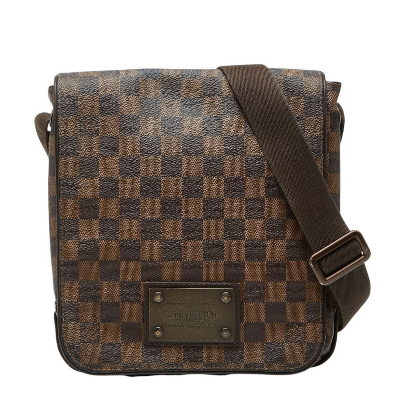 Louis Vuitton PVC and Leather Shoulder Bag: Louis Vuitton PVC and Leather Shoulder Bag A stylish and versatile Louis Vuitton shoulder bag, crafted from durable PVC and supple leather, is up for grabs. With its classic brown hue and sleek