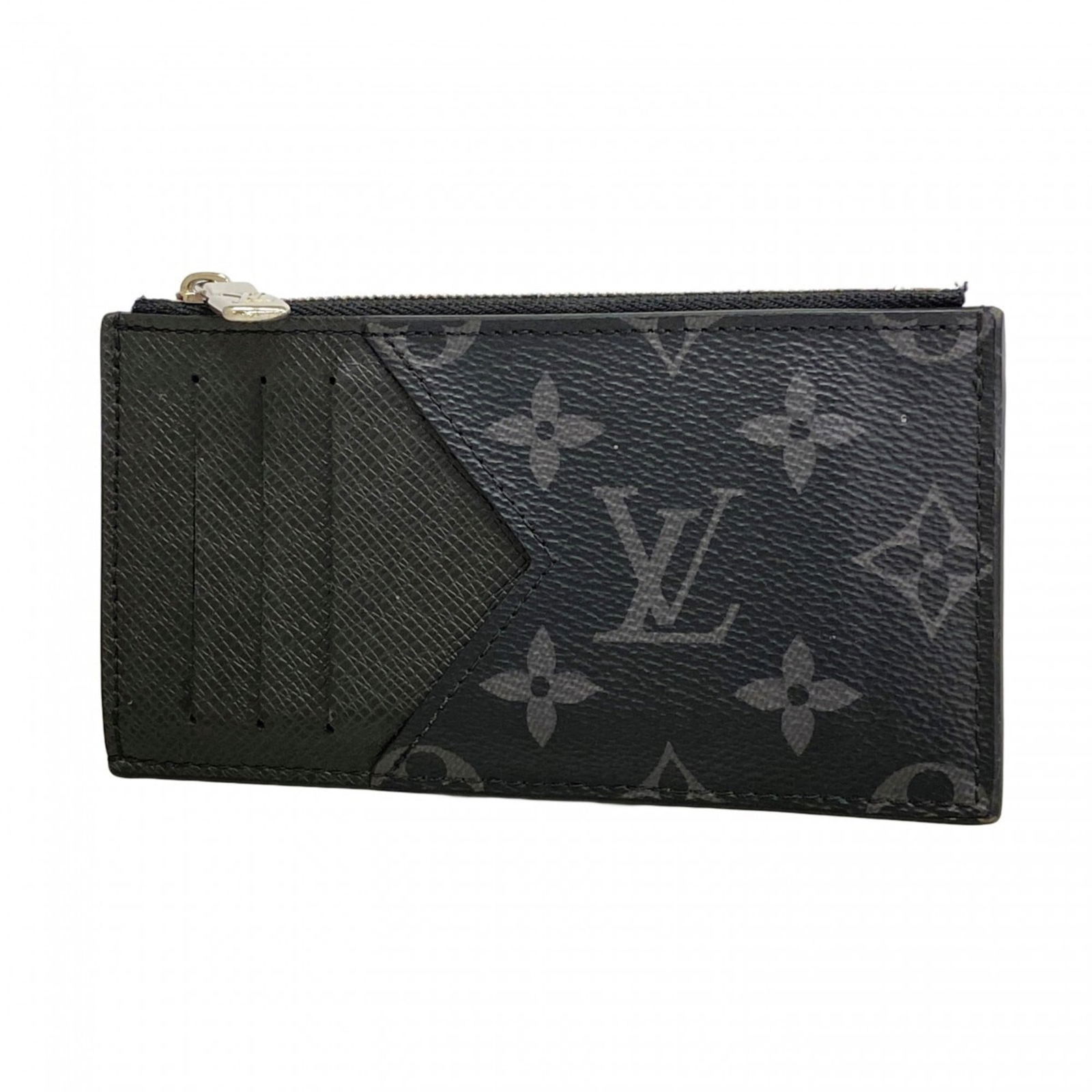 Louis Vuitton Coin Purse: Louis Vuitton Coin Purse A sleek and timeless accessory, this Louis Vuitton coin purse boasts the iconic monogram pattern in black, adding an air of sophistication to any outfit. Its compact size make