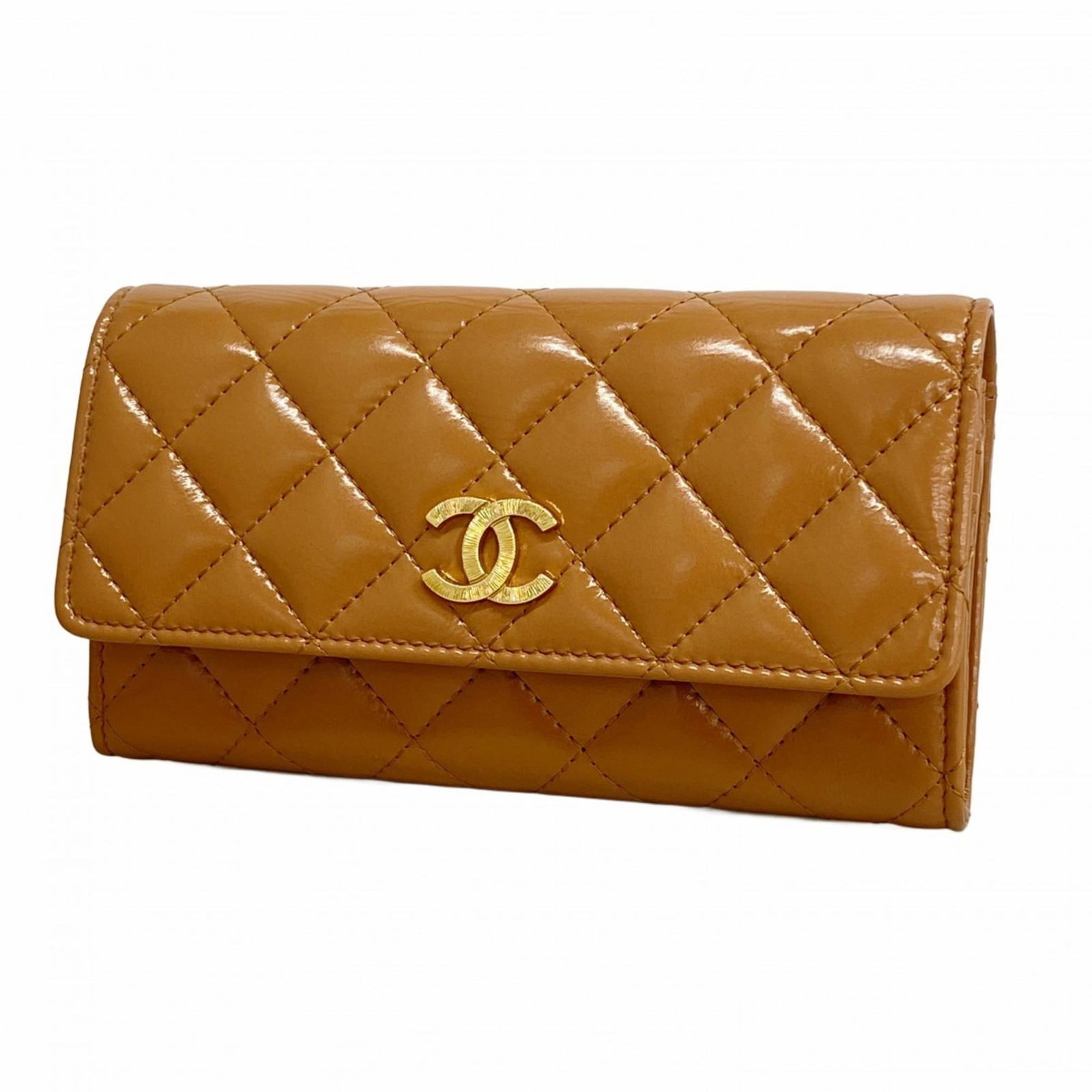 Chanel Bi-Fold Leather Wallet: Chanel Bi-Fold Leather Wallet A timeless piece of luxury, this Chanel bi-fold leather wallet boasts classic design and premium materials, with its signature pink beige color adding a touch of