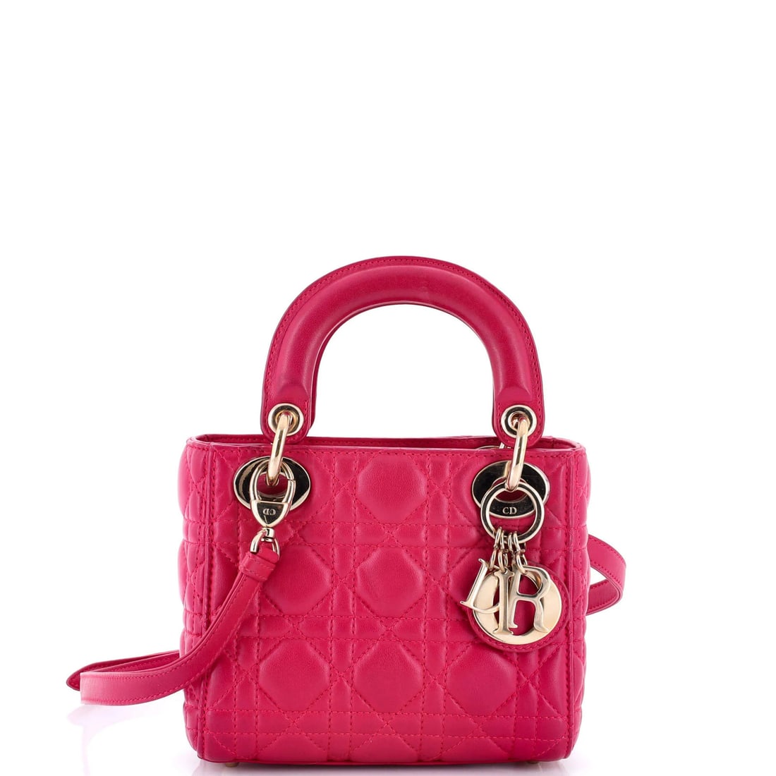 Christian Dior Lady Dior Bag - Cannage Quilt Lambskin Mini: Christian Dior Lady Dior Bag - Cannage Quilt Lambskin Mini The iconic Christian Dior Lady Dior Bag Cannage Quilt Lambskin Mini is a timeless masterpiece, boasting sleek pink exterior and neutral inter