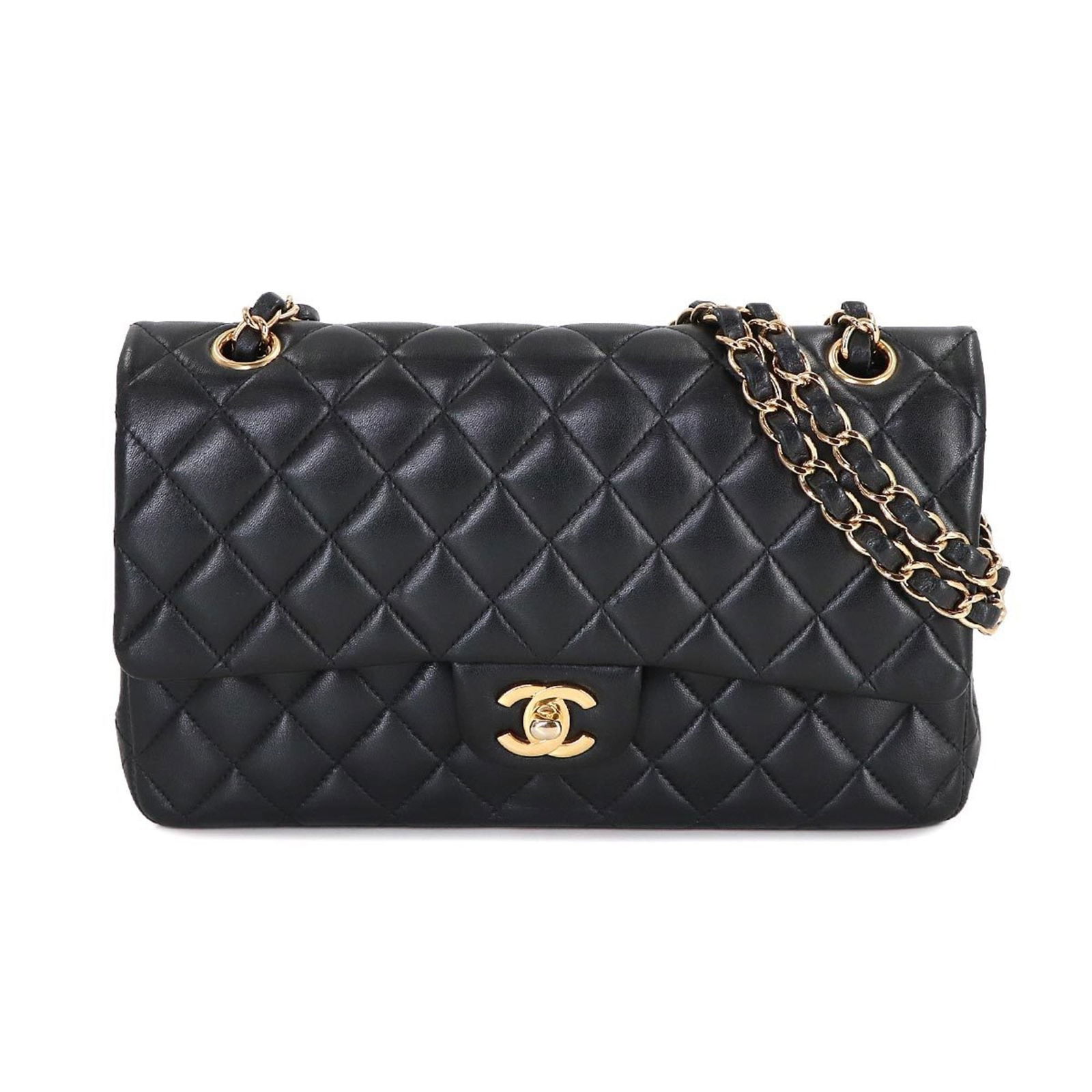 Chanel Shoulder Bag in Leather: Chanel Shoulder Bag in Leather A sleek and sophisticated Chanel shoulder bag, crafted from luxurious lambskin leather in rich black, adds a touch of timeless elegance to any outfit. With its classic d