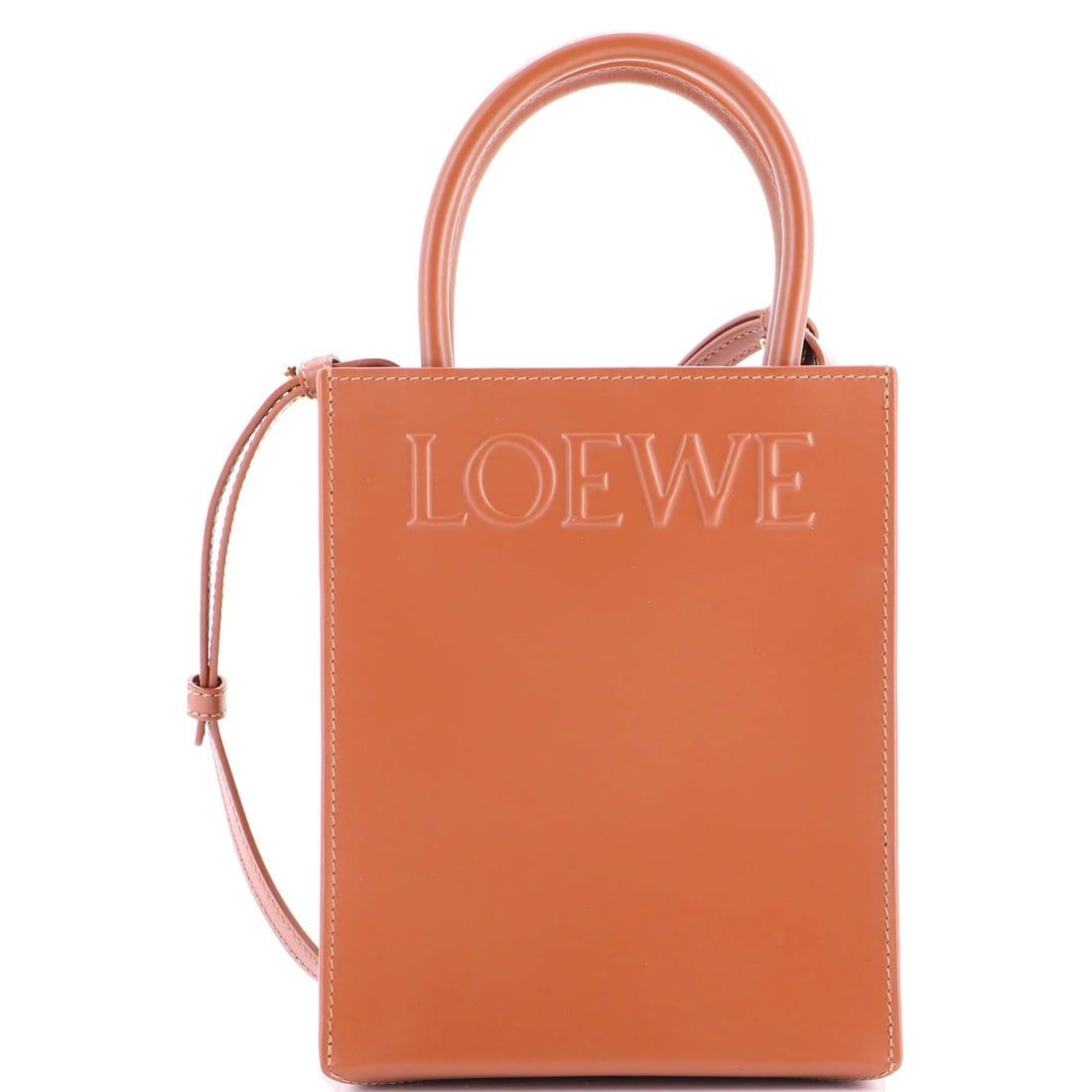 Loewe Standard A5 Convertible Leather Tote: Loewe Standard A5 Convertible Leather Tote The Loewe Standard A5 Convertible Leather Tote is a timeless and versatile accessory that combines classic style with practicality, boasting a rich brown