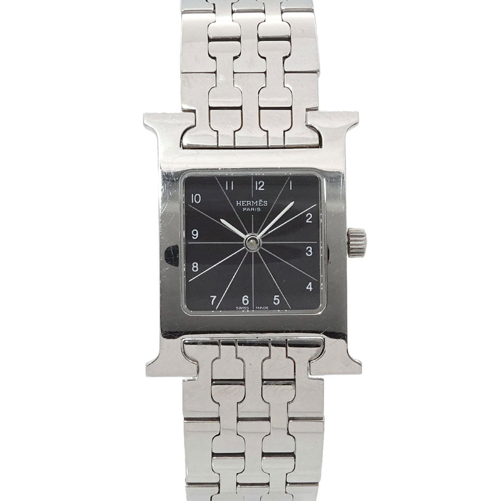 Wristwatch Hermes: Wristwatch Hermes A sleek and sophisticated Herm?s wristwatch, crafted from durable stainless steel, boasts a timeless black dial and elegant 21mm case diameter. With its classic design and high-quali