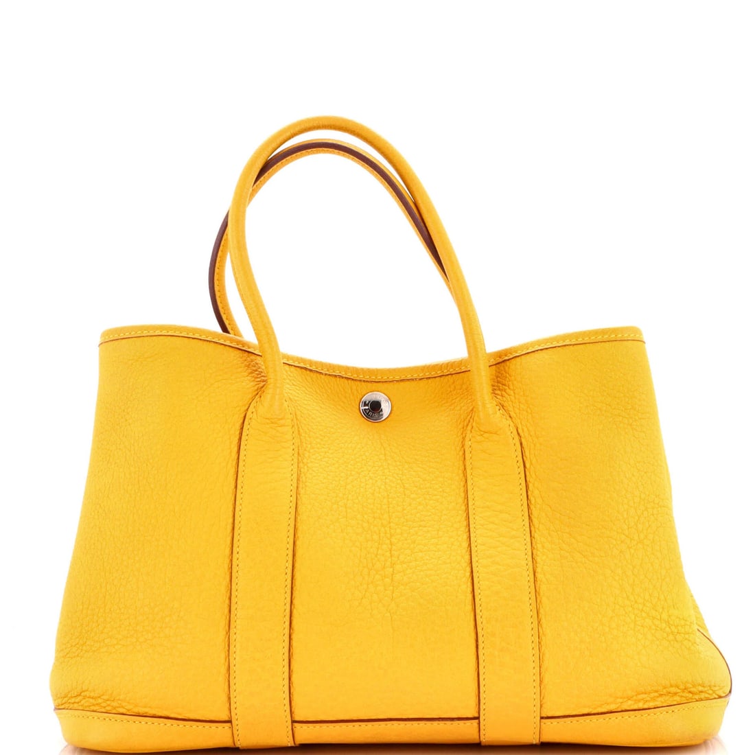 Hermes Garden Party Tote in Leather - 30: Hermes Garden Party Tote in Leather - 30 The iconic Hermes Garden Party Tote is a vibrant yellow leather tote that exudes effortless elegance. With its classic design, spacious interior, and