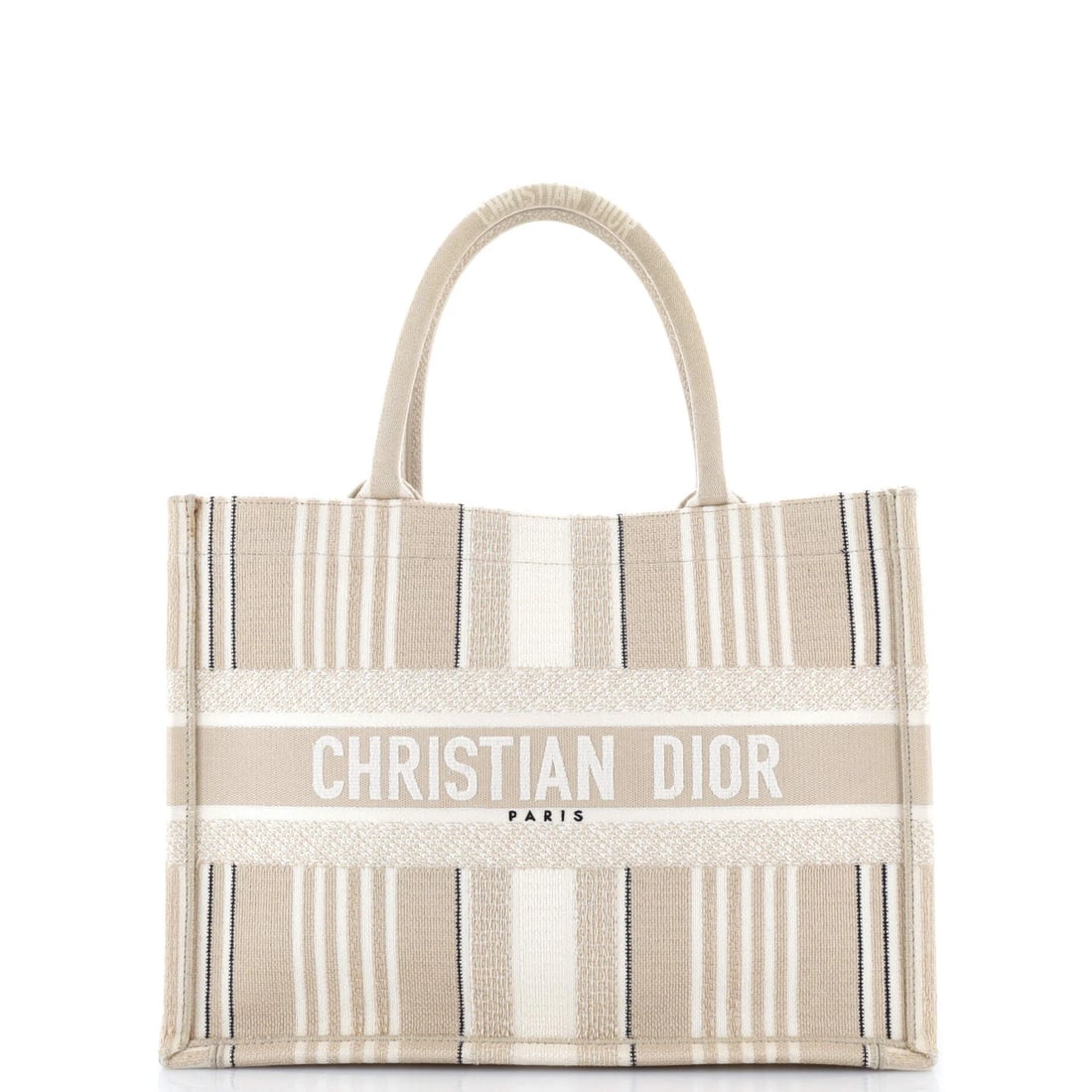 Christian Dior Bayadere Stripe Embroidered Canvas Medium Tote: Christian Dior Bayadere Stripe Embroidered Canvas Medium Tote A chic and timeless piece from Christian Dior, the Bayadere Stripe Embroidered Canvas Medium Tote boasts a neutral exterior with elegant