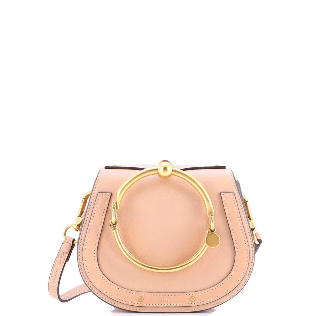 Chloe Nile Small Leather Crossbody Bag: Chloe Nile Small Leather Crossbody Bag Elevate your everyday style with the Chloe Nile Small Leather Crossbody Bag, boasting sleek neutral tones and supple suede interior. Its classic design is comple
