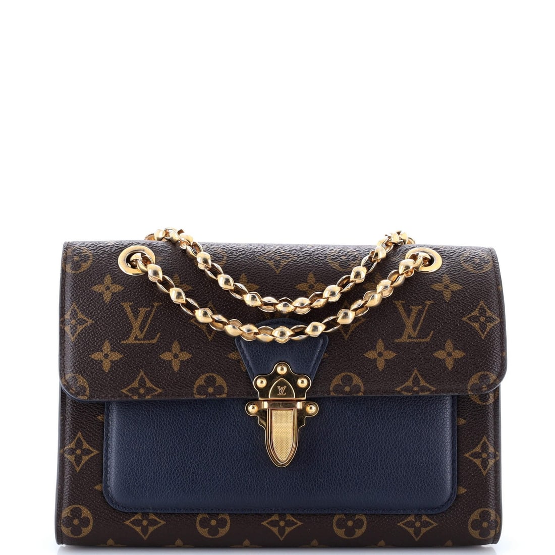 Louis Vuitton Victoire Monogram Canvas and Leather Handbag: Louis Vuitton Victoire Monogram Canvas and Leather Handbag Experience the timeless elegance of Louis Vuitton's iconic Victoire handbag, boasting a rich brown leather exterior adorned with the