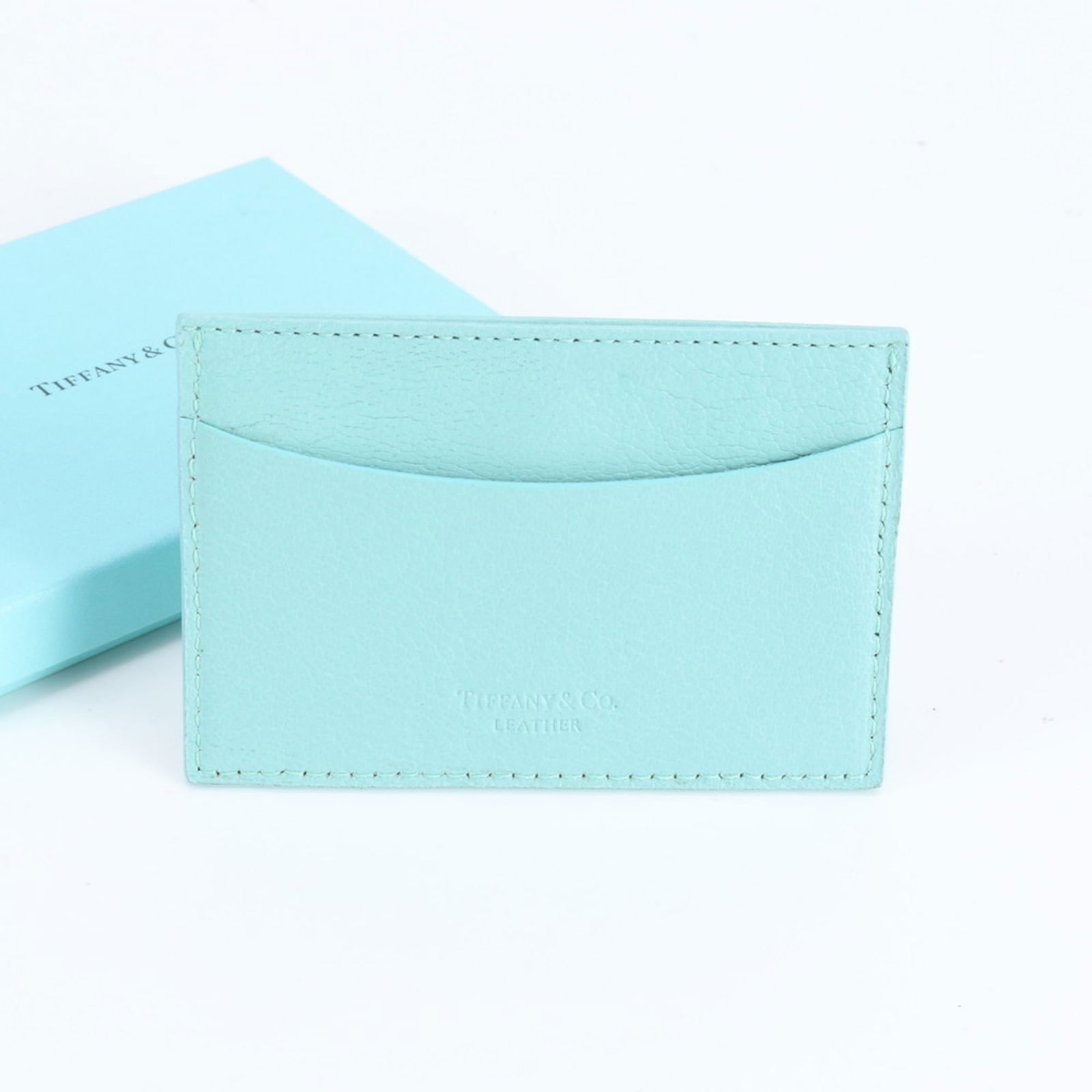 Tiffany Leather Business Card Case: Tiffany Leather Business Card Case Elevate your professional style with the iconic Tiffany Leather Business Card Case, crafted from rich, high-quality leather in signature Tiffany Blue. With its