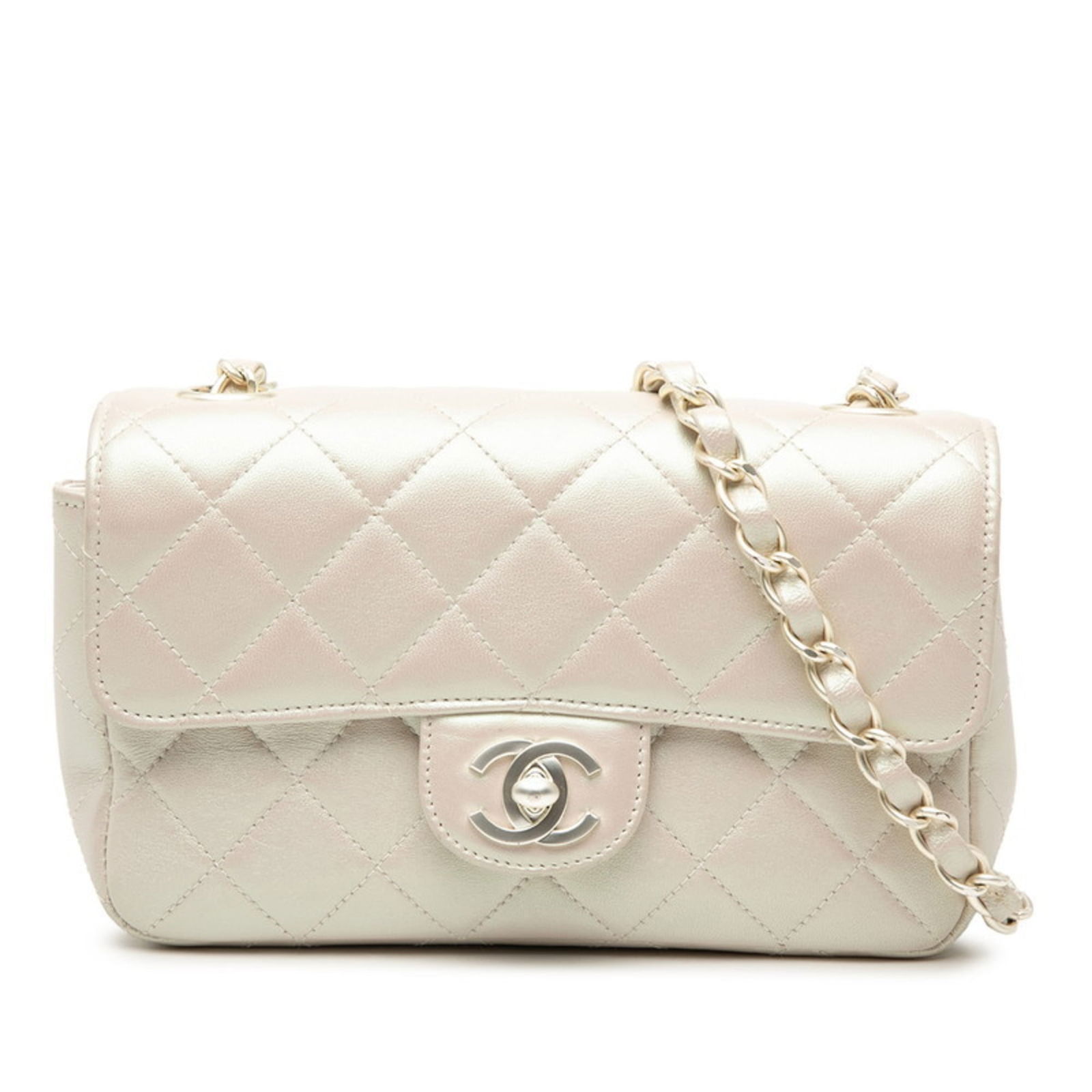 Chanel Shoulder Bag in Leather: Chanel Shoulder Bag in Leather A timeless Chanel shoulder bag in luxurious lambskin leather, adorned with gold hardware and subtle pearl accents, adds a touch of sophisticated elegance to any outfit.