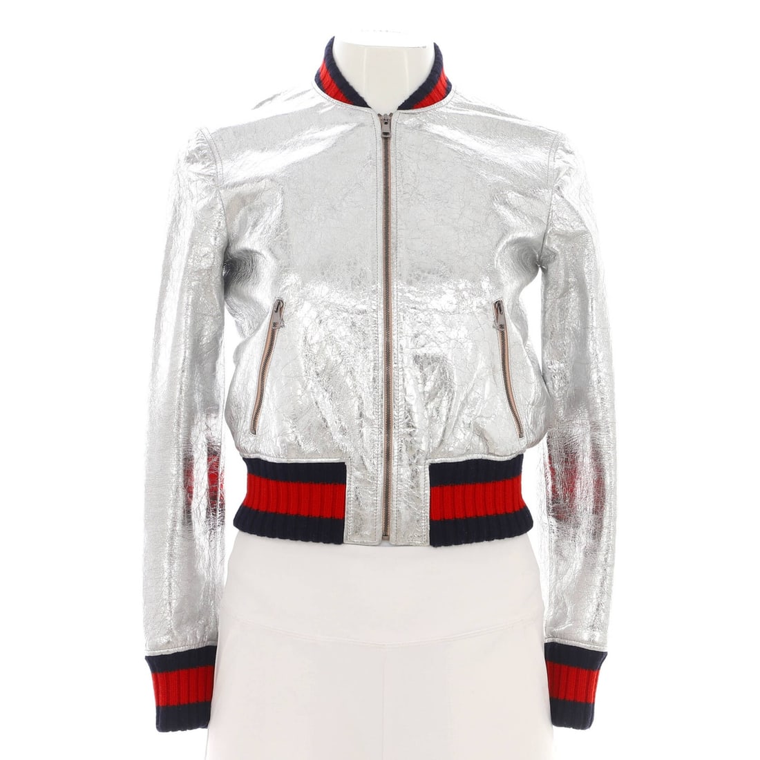 Gucci Women's Metallic Leather Bomber Jacket: Gucci Women's Metallic Leather Bomber Jacket Elevate your wardrobe with the Gucci Women's Metallic Leather Bomber Jacket, boasting a striking silver metallic leather exterior and luxurious silk