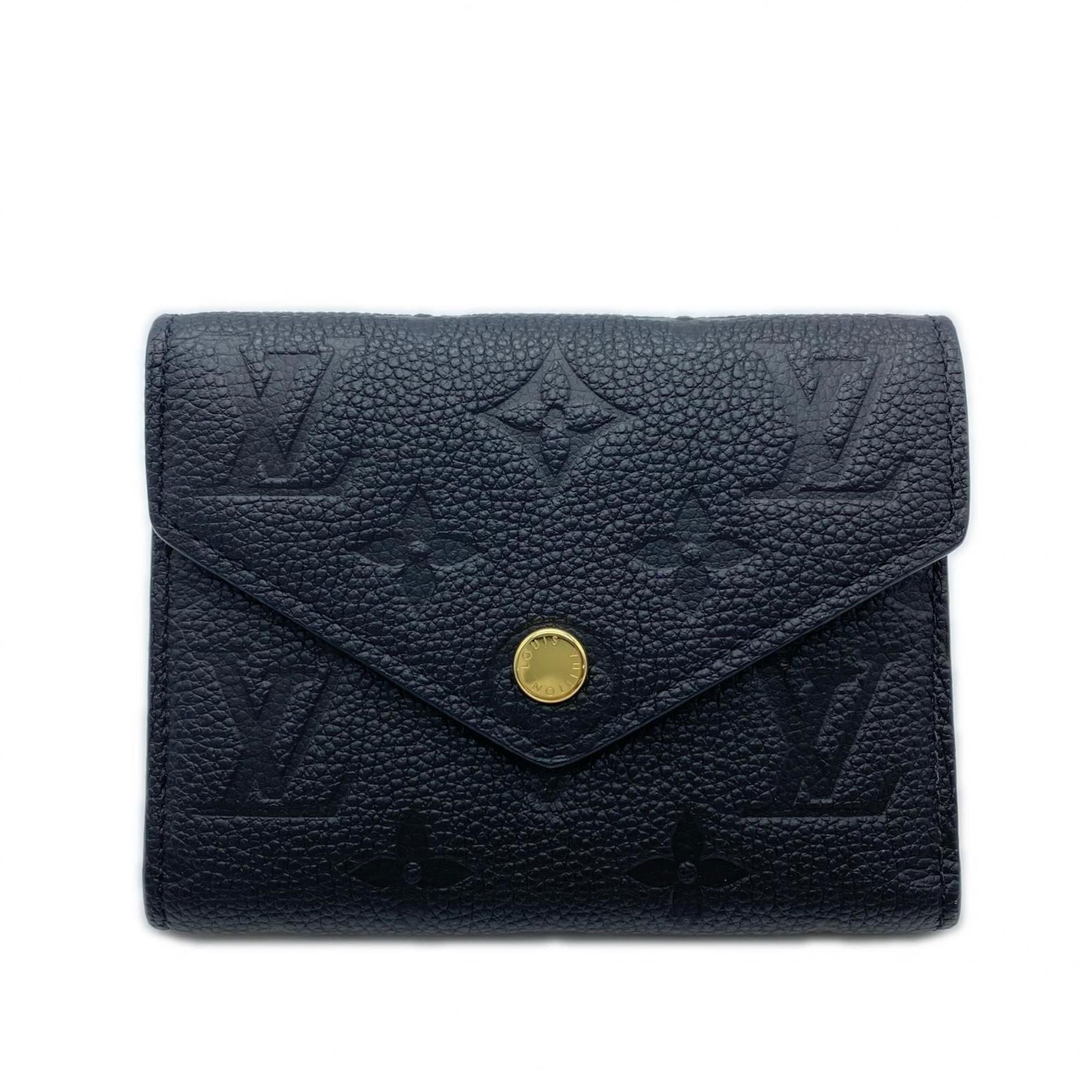 Louis Vuitton Tri-Fold Leather Wallet: Louis Vuitton Tri-Fold Leather Wallet A timeless piece from the iconic Louis Vuitton brand, this tri-fold leather wallet boasts classic design and premium quality. Made from durable calf leather, it o