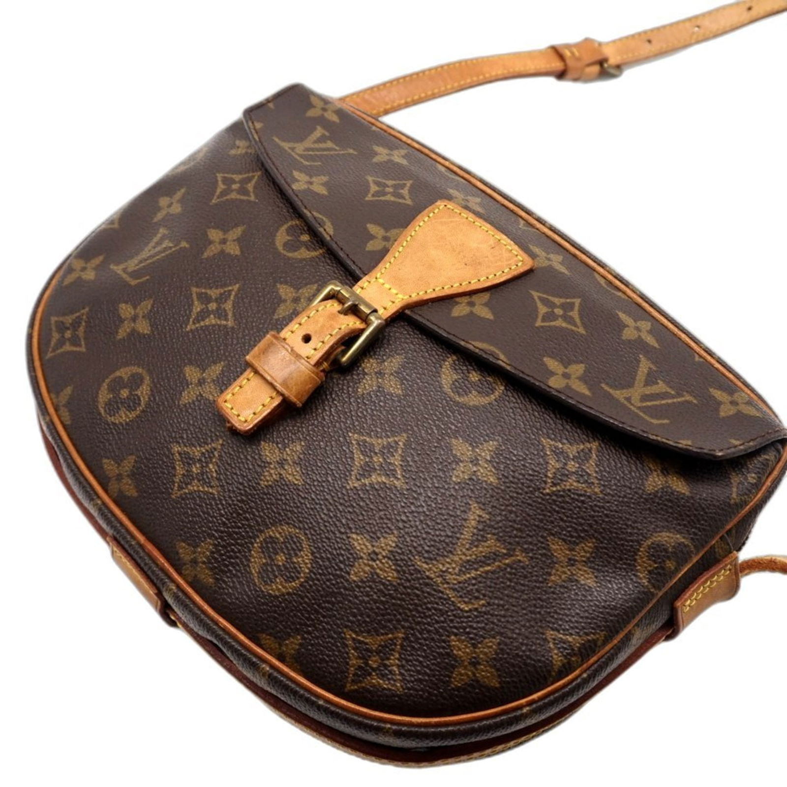 Louis Vuitton Coated Canvas Leather Shoulder Bag: Louis Vuitton Coated Canvas Leather Shoulder Bag A timeless Louis Vuitton shoulder bag, crafted from luxurious coated canvas and supple leather, boasts a classic brown hue that exudes sophistication.