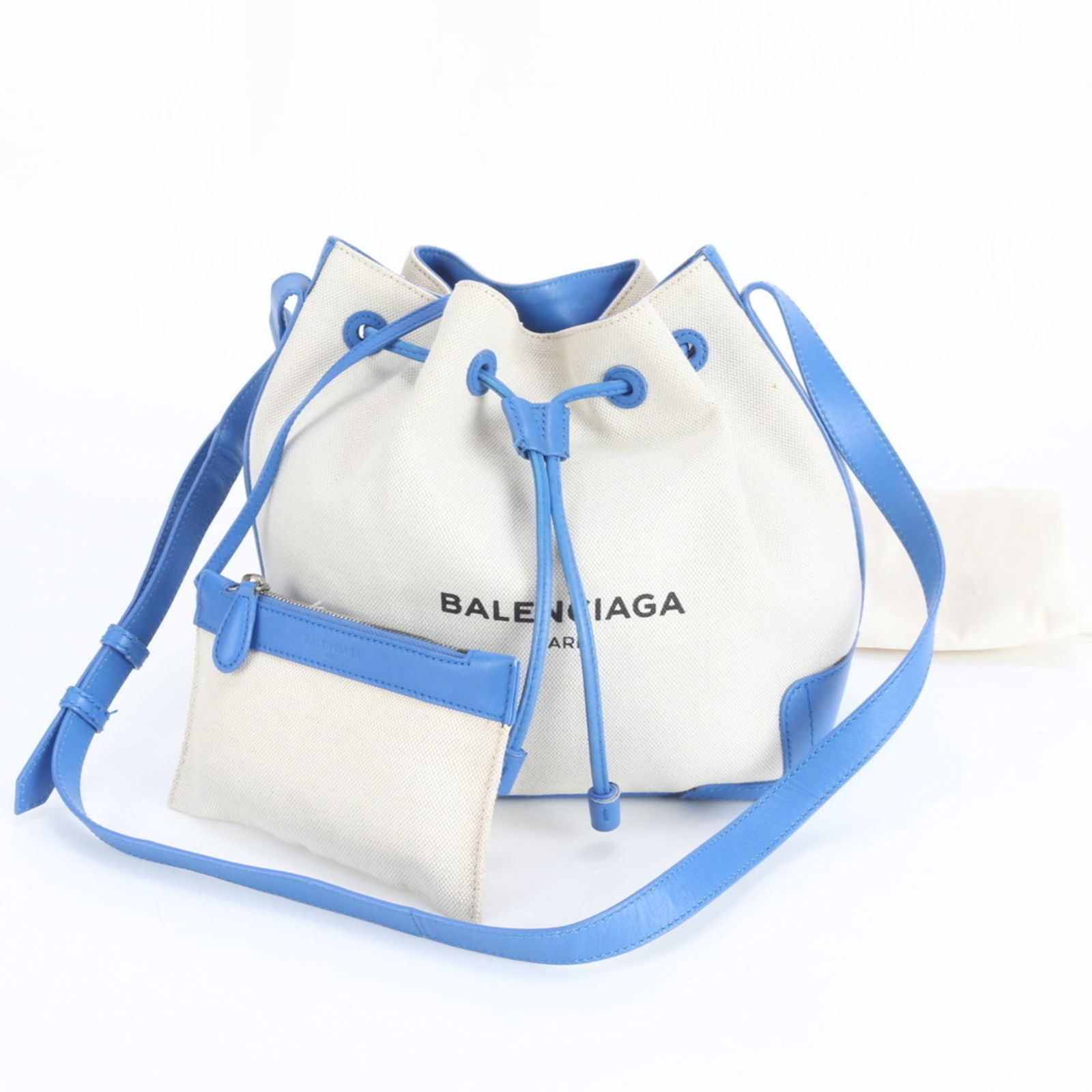 Balenciaga Shoulder Bag - Leather and Canvas: Balenciaga Shoulder Bag - Leather and Canvas A timeless Balenciaga shoulder bag, crafted from luxurious leather and canvas, boasts a chic beige and blue color combination that adds a touch of