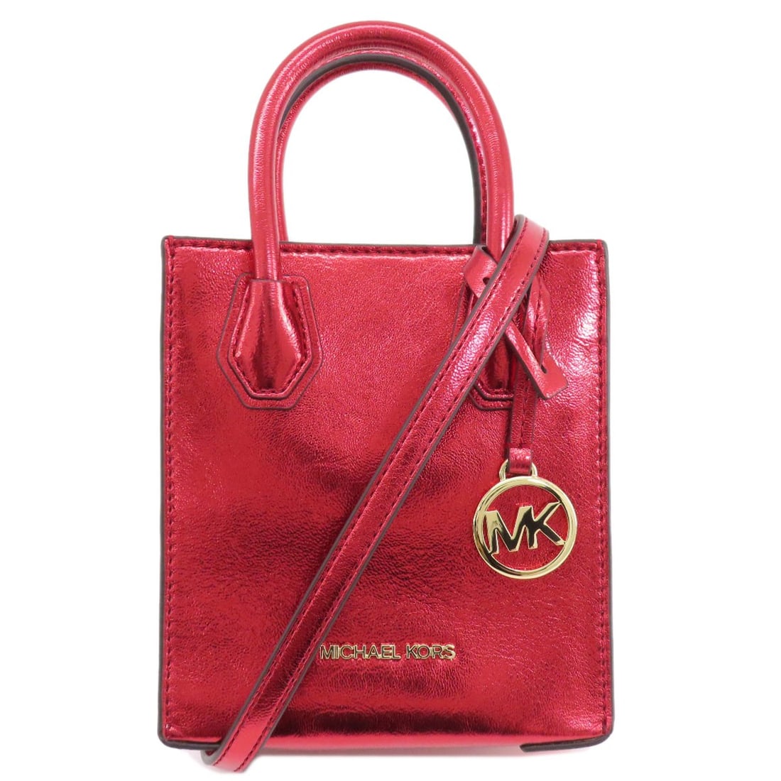 PVC Michael Kors Logo 2WAY Handbag: PVC Michael Kors Logo 2WAY Handbag Make a statement with this bold PVC Michael Kors 2WAY handbag, boasting a sleek metallic red exterior that shines bright. The iconic logo is prominently displayed