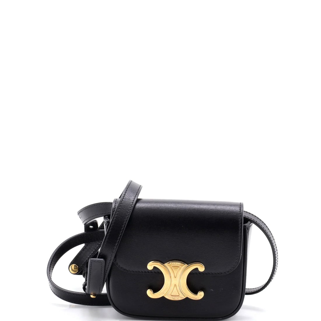 Celine Triomphe Mini Shoulder Bag in Smooth Calfskin: Celine Triomphe Mini Shoulder Bag in Smooth Calfskin The Celine Triomphe Mini Shoulder Bag is a sleek and sophisticated accessory that exudes understated elegance. Made from smooth calfskin leather, t