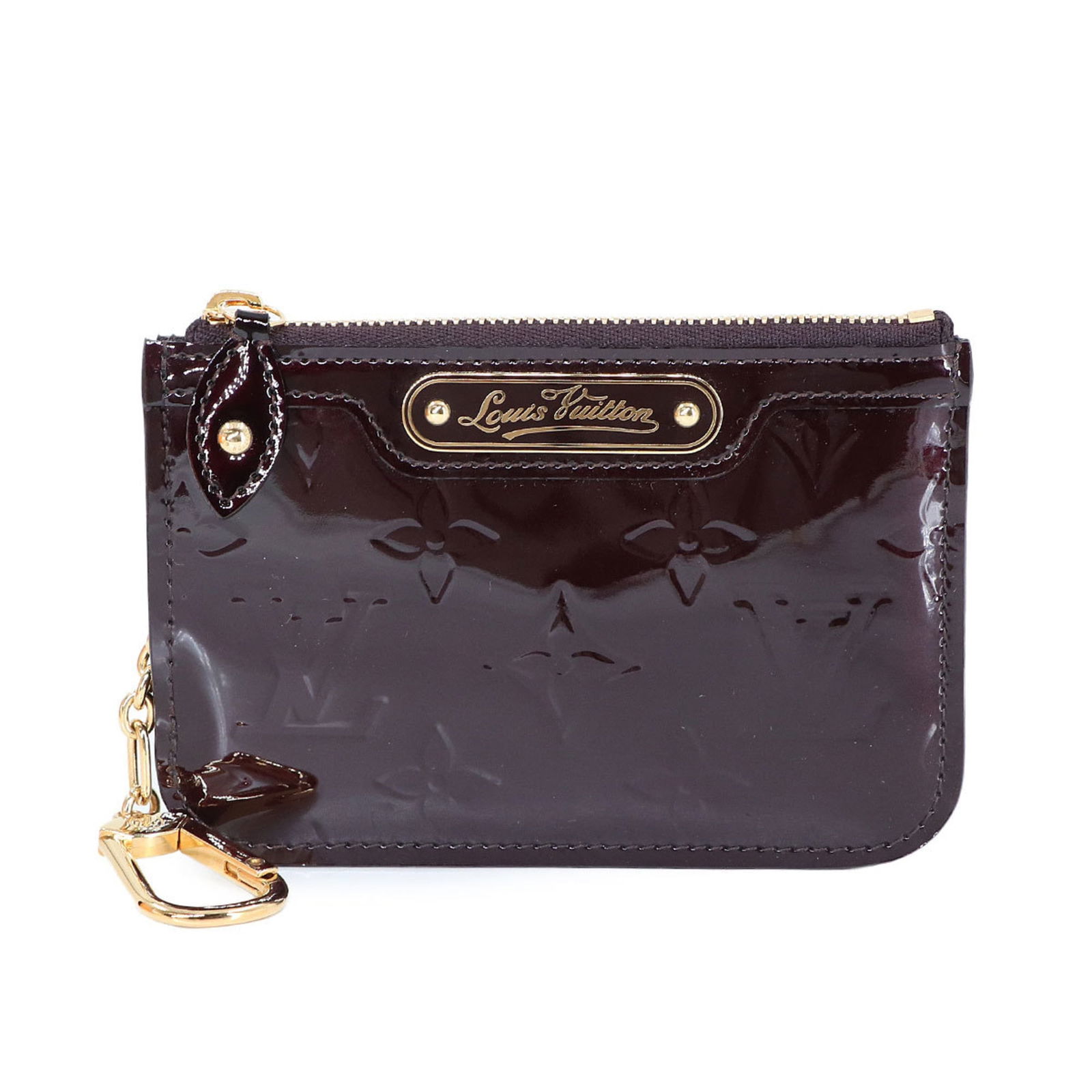 Louis Vuitton Vernis Coin Purse: Louis Vuitton Vernis Coin Purse Elevate your everyday style with the iconic Louis Vuitton Vernis Coin Purse, boasting the signature Vernis finish in rich Amarante hue. This sleek and sophisticated coi