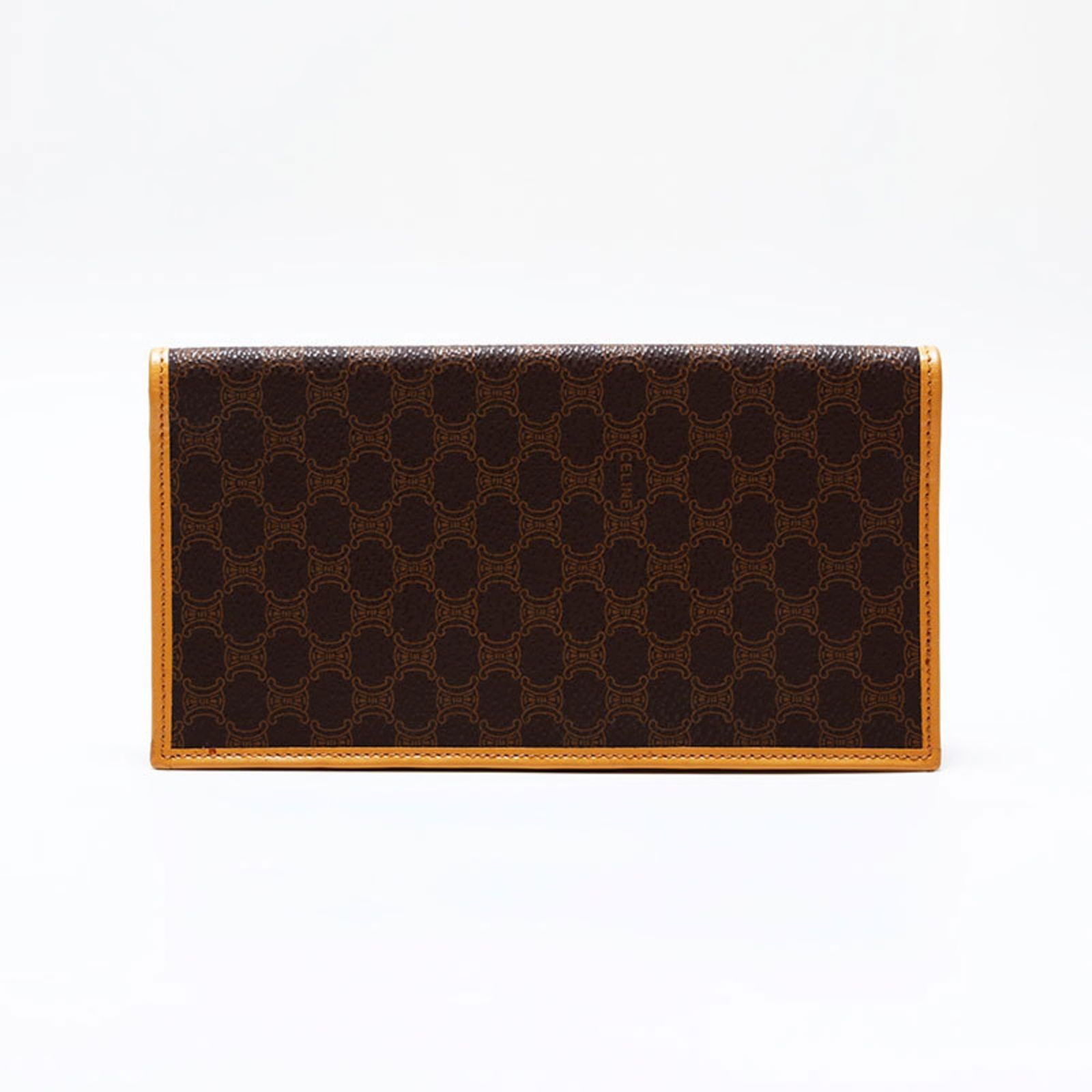 Celine Bi-Fold Wallet: Celine Bi-Fold Wallet A pre-owned Celine bi-fold wallet in rich brown leather, boasting a timeless design and sleek silhouette that exudes understated elegance. With its sturdy construction and