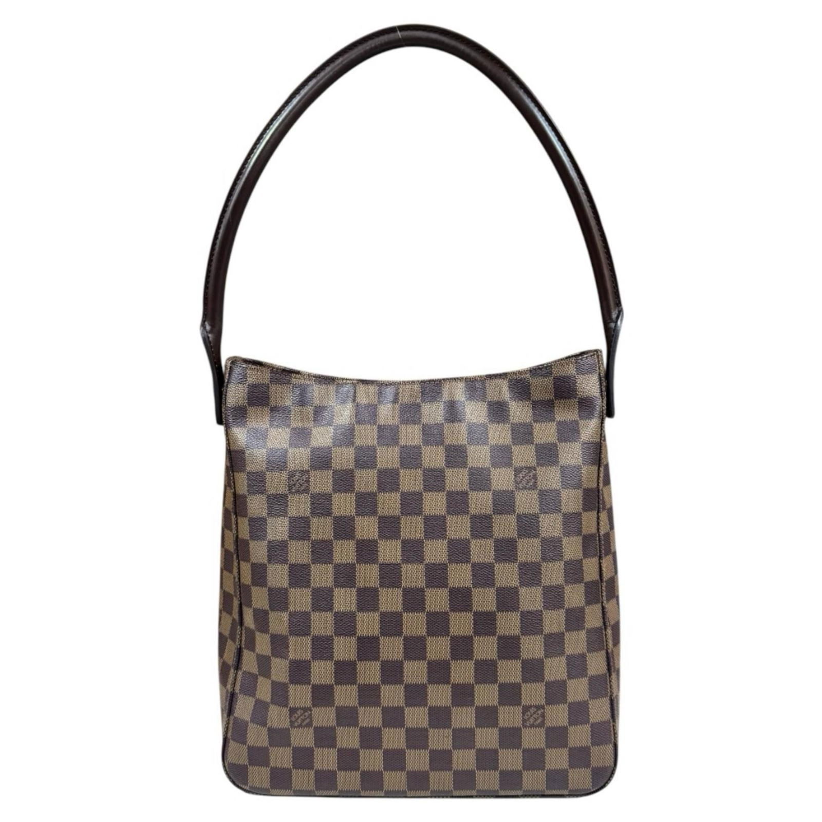 Louis Vuitton Damier Canvas Shoulder Bag: Louis Vuitton Damier Canvas Shoulder Bag A timeless piece from the iconic Louis Vuitton brand, this Damier Canvas shoulder bag exudes classic sophistication with its rich brown color and signature