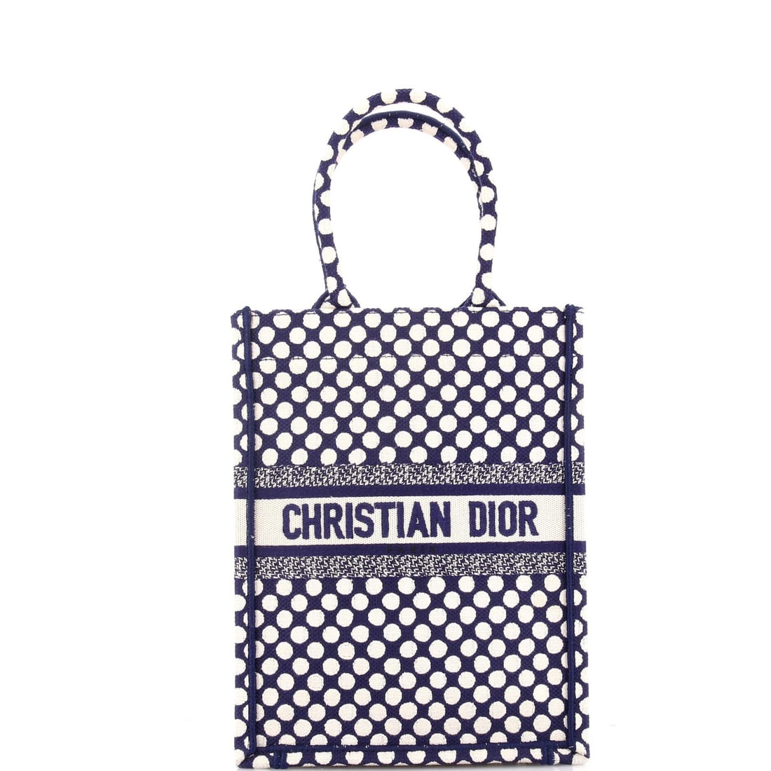 Christian Dior Book Tote in Printed Canvas Vertical: Christian Dior Book Tote in Printed Canvas Vertical Elevate your daily routine with the timeless charm of Christian Dior's Book Tote in Printed Canvas Vertical. This stylish tote boasts a vibrant