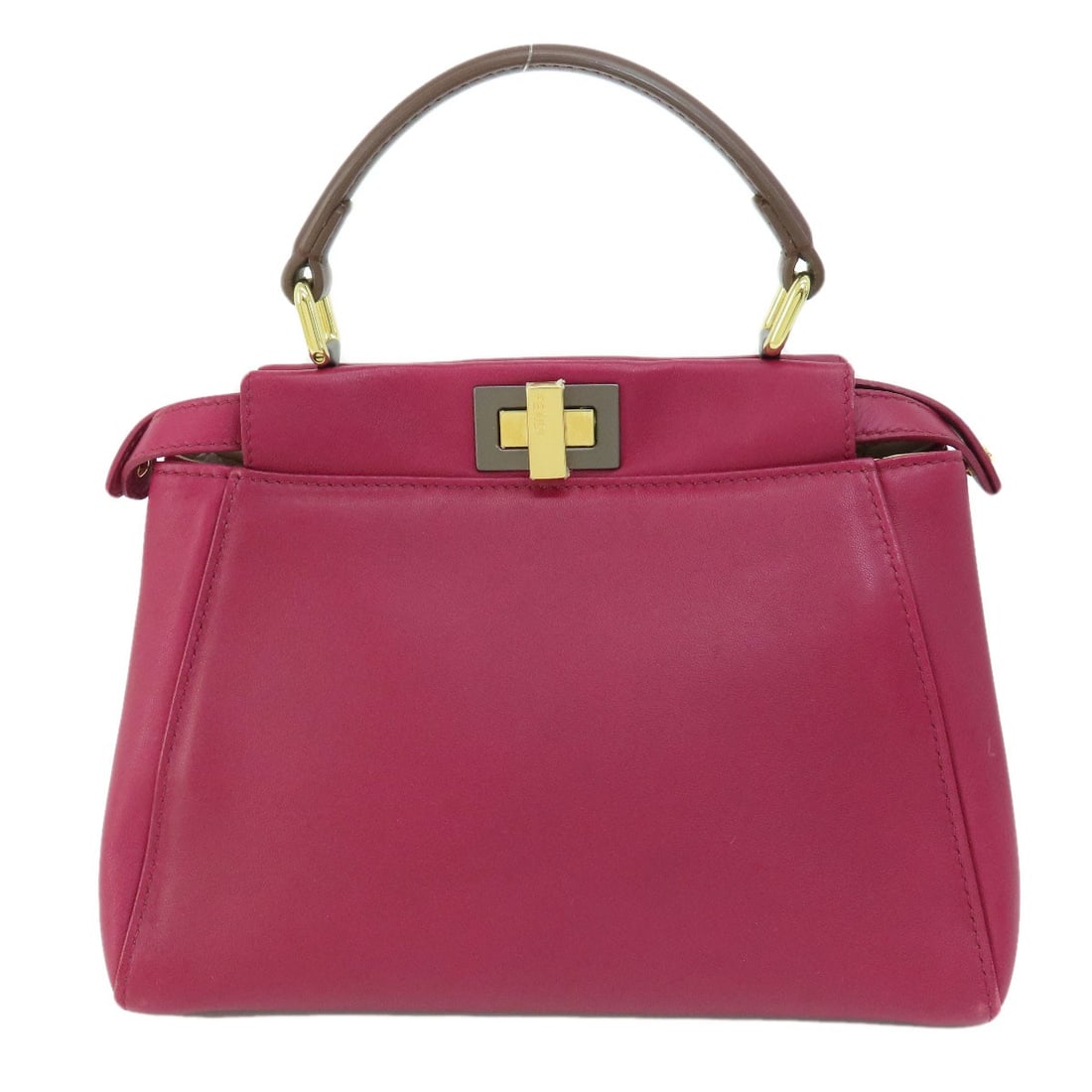Calf FENDI Peek-a-boo mini Handbag: Calf FENDI Peek-a-boo mini Handbag Elevate your style with the FENDI Peek-a-boo mini handbag, crafted from rich calf leather in a stunning purple hue. This chic, Italian-made bag boasts a sleek
