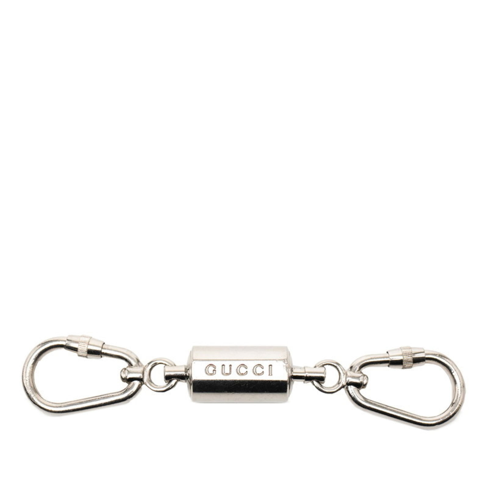 Gucci Keyring in Metal: Gucci Keyring in Metal A sleek and sophisticated accessory, this Gucci keyring in metal adds a touch of luxury to any outfit. With its silver finish and classic design, it's the perfect complement to