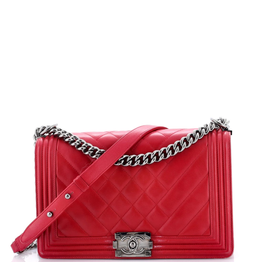 Medium Chanel Boy Flap Bag Mixed Quilted Chevron Calfskin Old: Medium Chanel Boy Flap Bag Mixed Quilted Chevron Calfskin Old A stunning vintage Chanel Boy Flap Bag, boasting its iconic quilted chevron design and rich red exterior, adds a touch of timeless