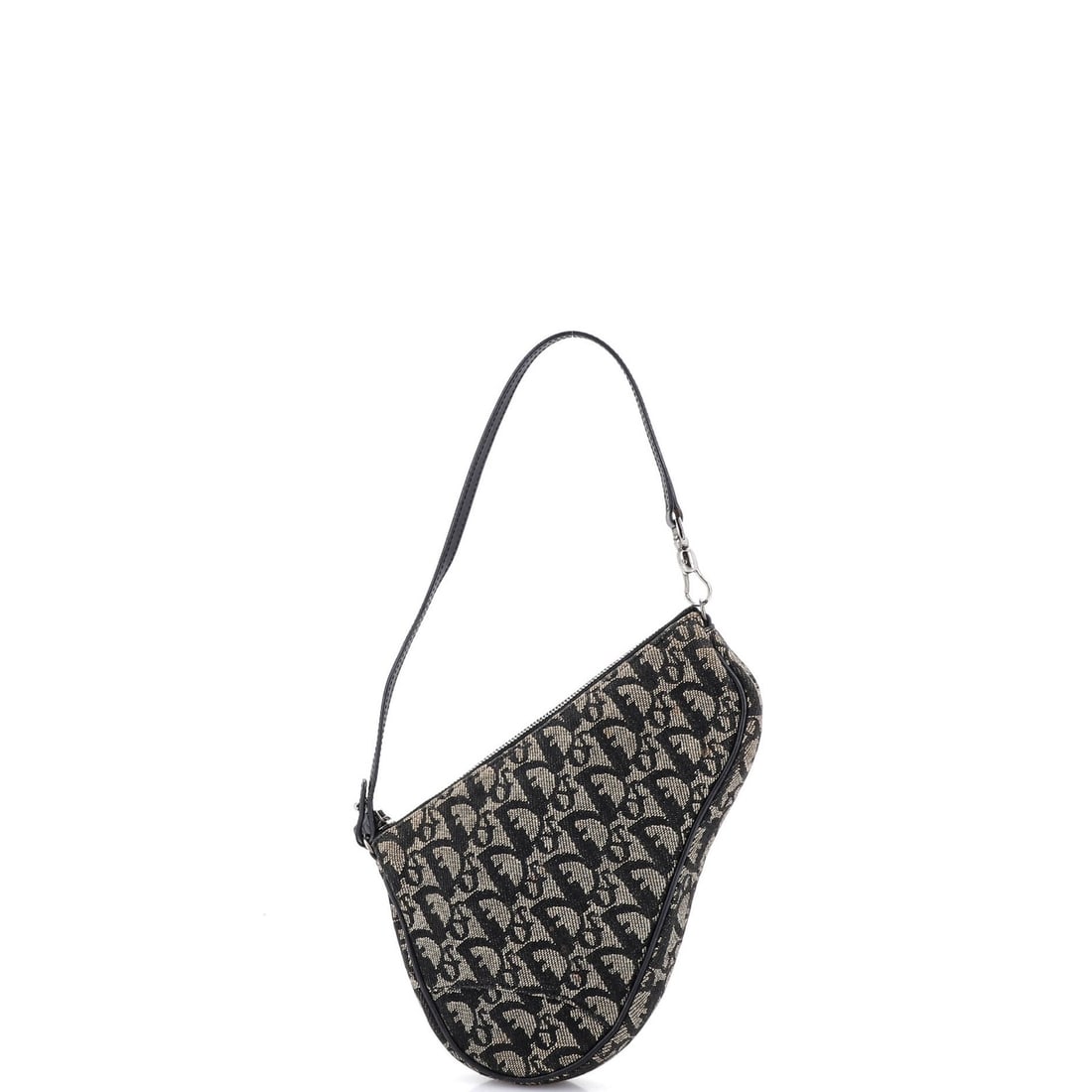 Christian Dior Vintage Saddle Bag in Diorissimo Canvas Mini: Christian Dior Vintage Saddle Bag in Diorissimo Canvas Mini A rare and elegant vintage find, this Christian Dior Saddle Bag in Diorissimo canvas is a true collector's item. With its iconic blue hue