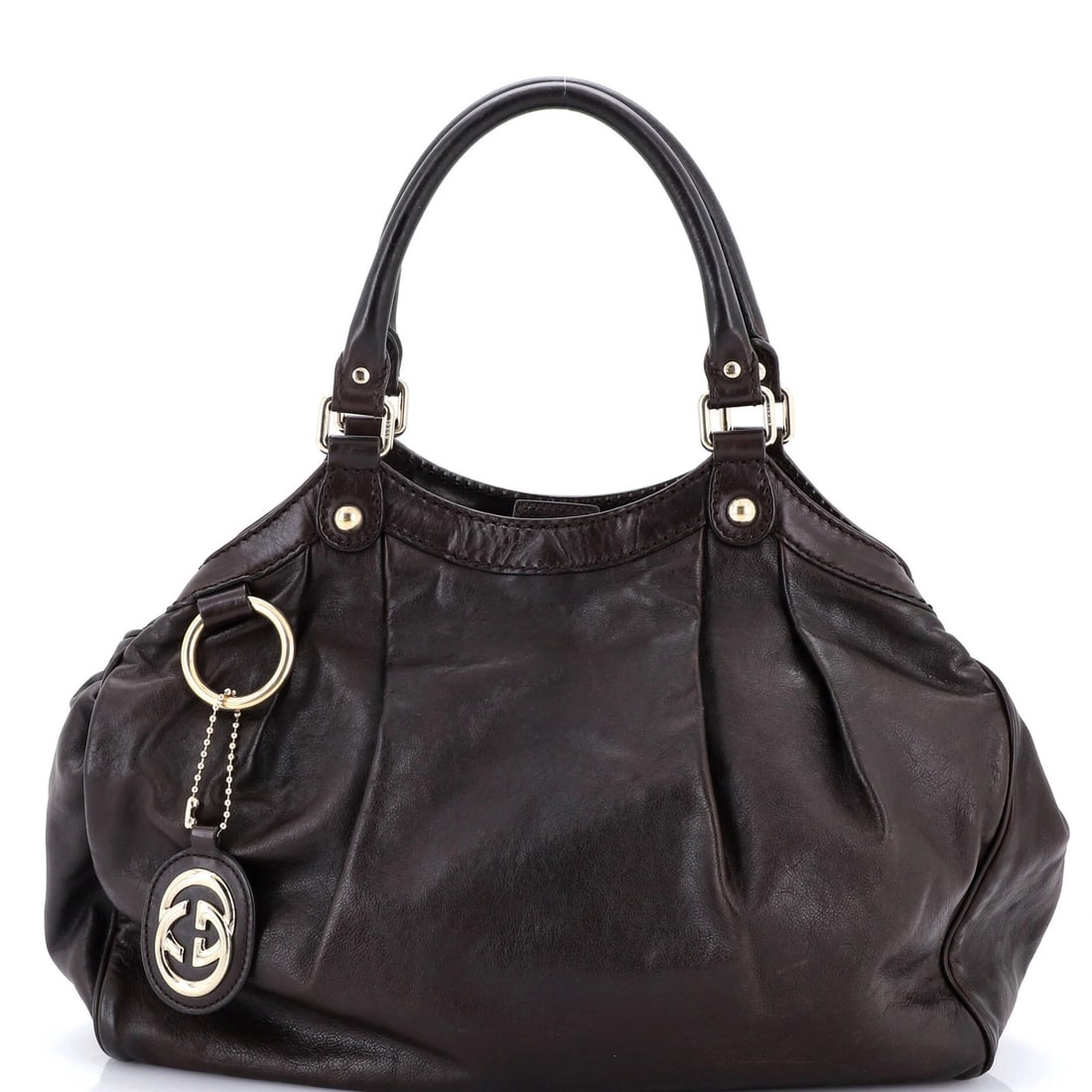 Gucci Sukey Medium Leather Tote: Gucci Sukey Medium Leather Tote The Gucci Sukey Medium Leather Tote is a timeless and sophisticated accessory, boasting luxurious medium-grain leather exterior in rich brown hue. With its classic