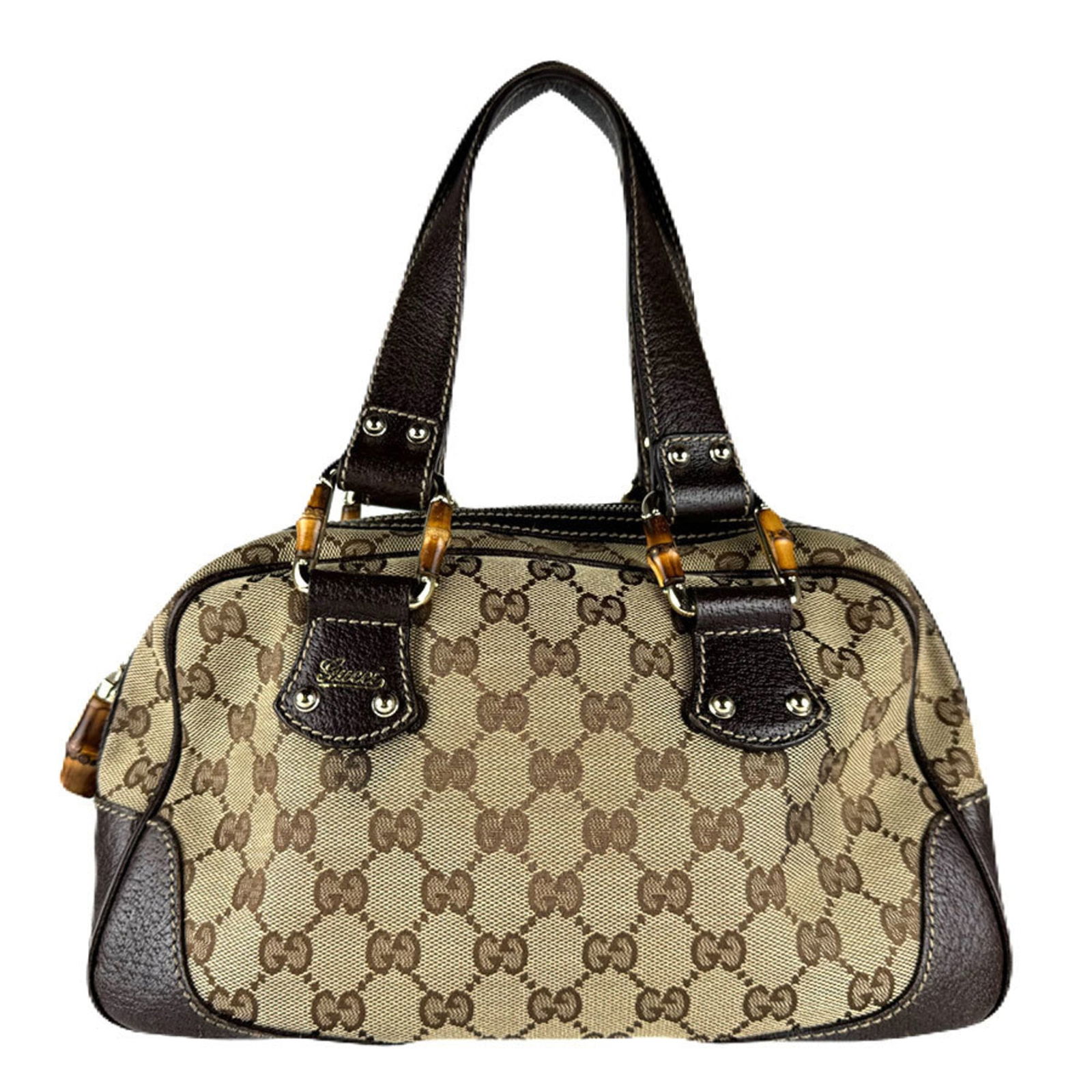 Gucci Canvas and Leather Handbag: Gucci Canvas and Leather Handbag A timeless Gucci handbag with a perfect blend of canvas and leather, this brown beauty boasts a classic design that exudes sophistication and elegance. With its
