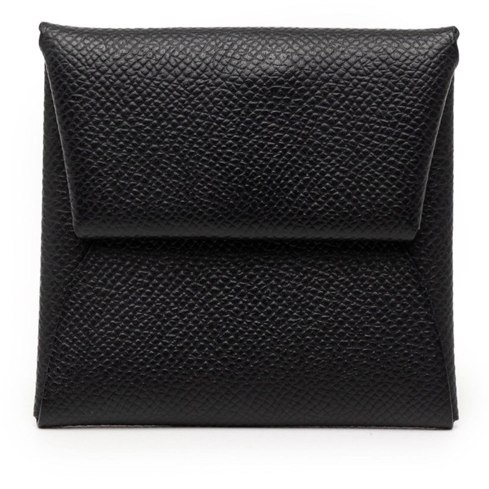 Hermes Coin Purse/ Case Epsom Leather: Hermes Coin Purse/ Case Epsom Leather A sleek and sophisticated accessory for the modern woman, this Hermes coin purse/case is crafted from rich Epsom leather in a timeless black hue. Its compact