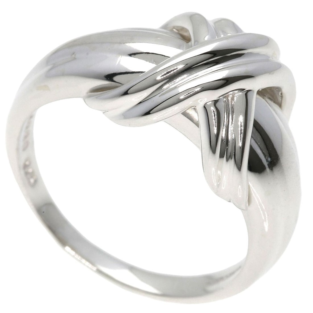 Tiffany & Co. Signature Silver Ring: Tiffany & Co. Signature Silver Ring A timeless piece of American elegance, the Tiffany & Co. Signature Silver Ring is a masterclass in understated sophistication. Crafted from sterling silver and