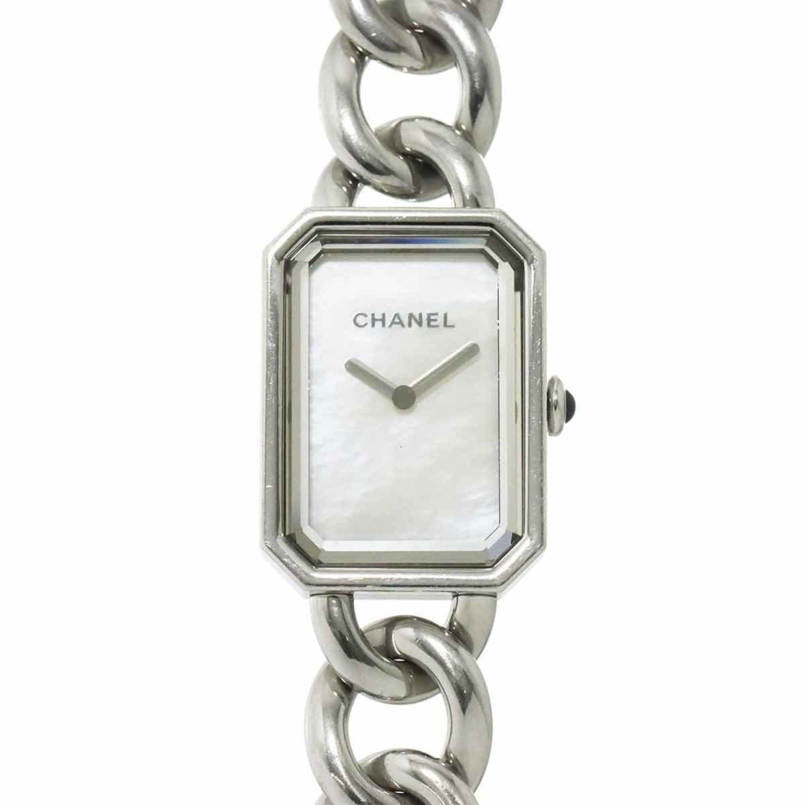 Wristwatch Chanel: Wristwatch Chanel A stunning Chanel wristwatch in excellent condition, boasting a sleek stainless steel case and band that exudes timeless elegance. The crisp white dial adds a touch of