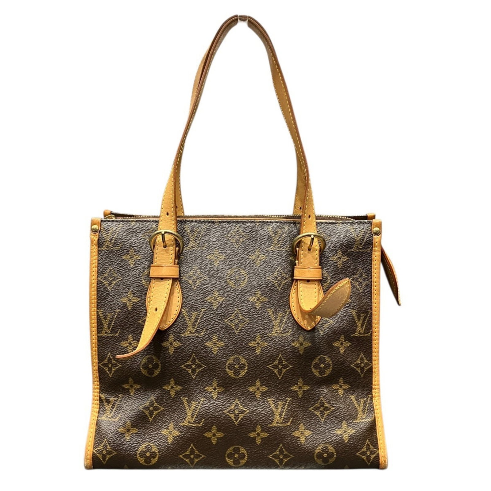 Louis Vuitton PVC Tote Bag: Louis Vuitton PVC Tote Bag A stylish and durable Louis Vuitton PVC tote bag, perfect for everyday use, boasts the iconic monogram pattern in rich brown hues. With its sleek design and sturdy PVC const