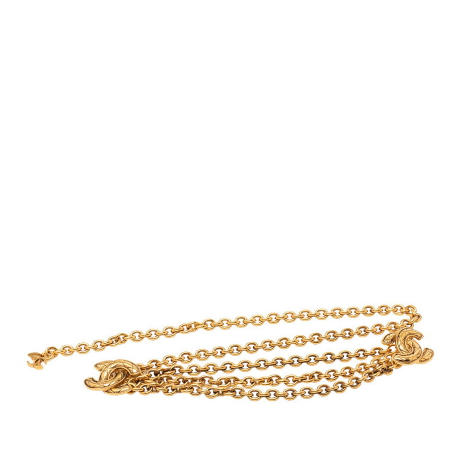 Belt Chanel Chain: Belt Chanel Chain A luxurious gold chain belt from the iconic Chanel brand, adding a touch of sophistication to any outfit with its sleek 82cm length and slim 3cm width. With its classic design and hi