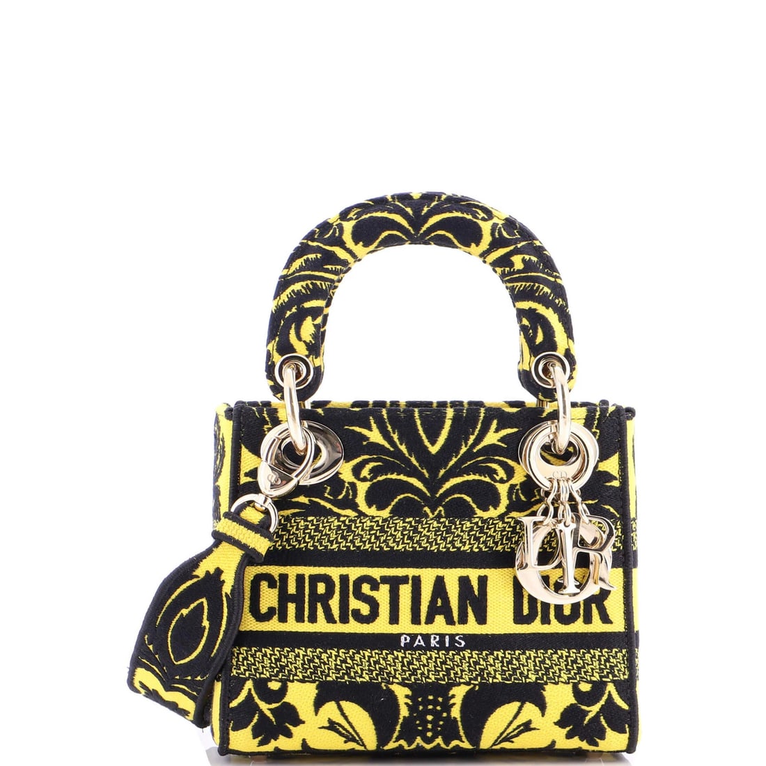 Mini Christian Dior Lady D-Lite Bag Embroidered Canvas: Mini Christian Dior Lady D-Lite Bag Embroidered Canvas A stunning mini version of the iconic Christian Dior Lady D-Lite bag, this embroidered canvas tote boasts bright yellow hues and sleek gold hardw